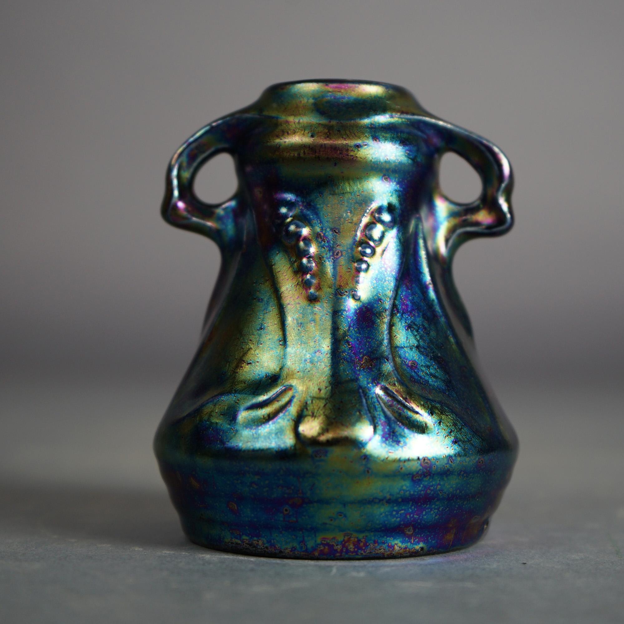 Antique ARts and Crafts Weller Heliosine Iridescent Pottery Double Handled Vase with Stylized Floral Decoration C1920

Measures - 4