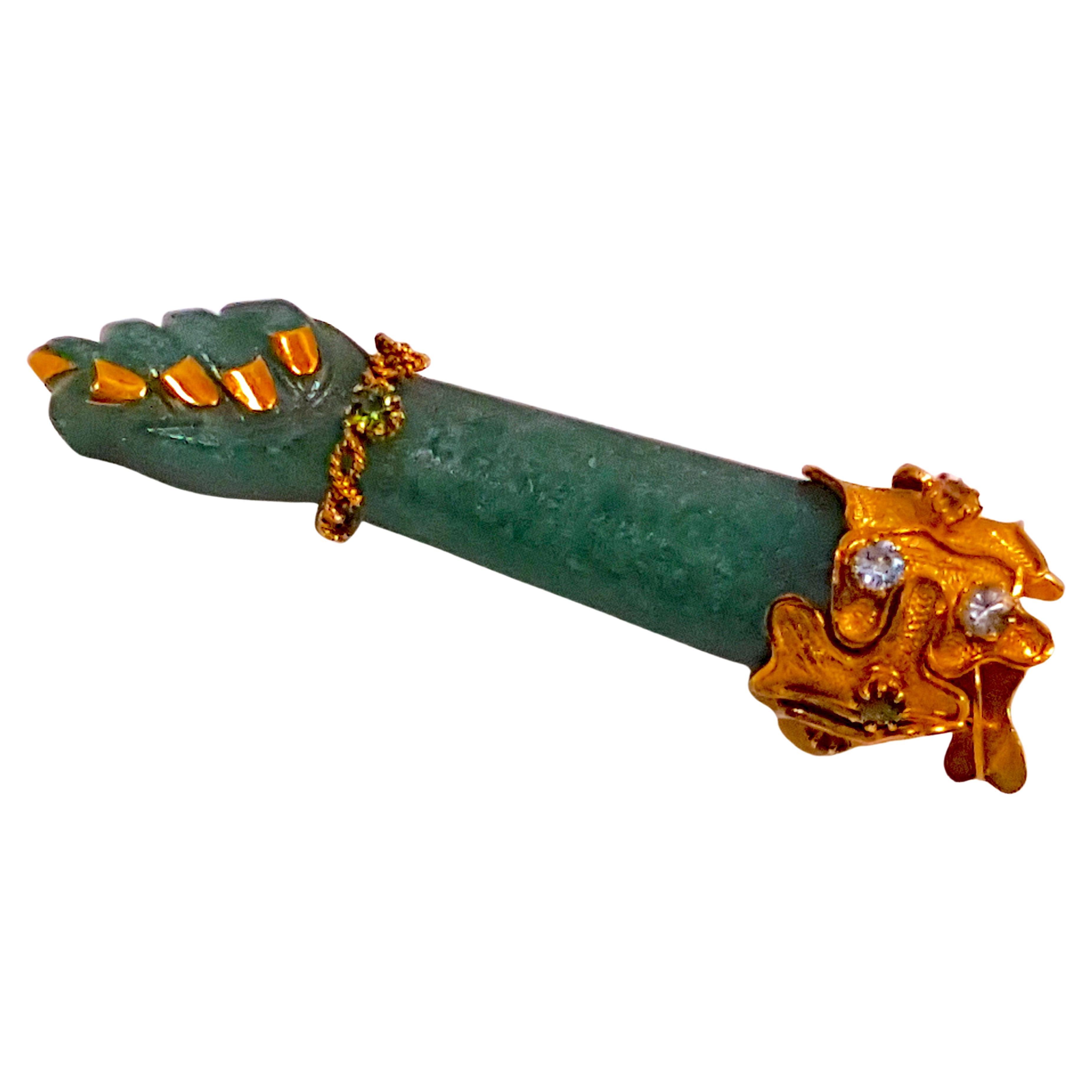 With elements of the cross-over late-Arts&Crafts and early-Art-Nouveau movements, this antique turn-of-the-century mottled-green jade amulet pendant is elaborately decorated in a Baroque-Revival style with 18K yellow gold, as well as with 10