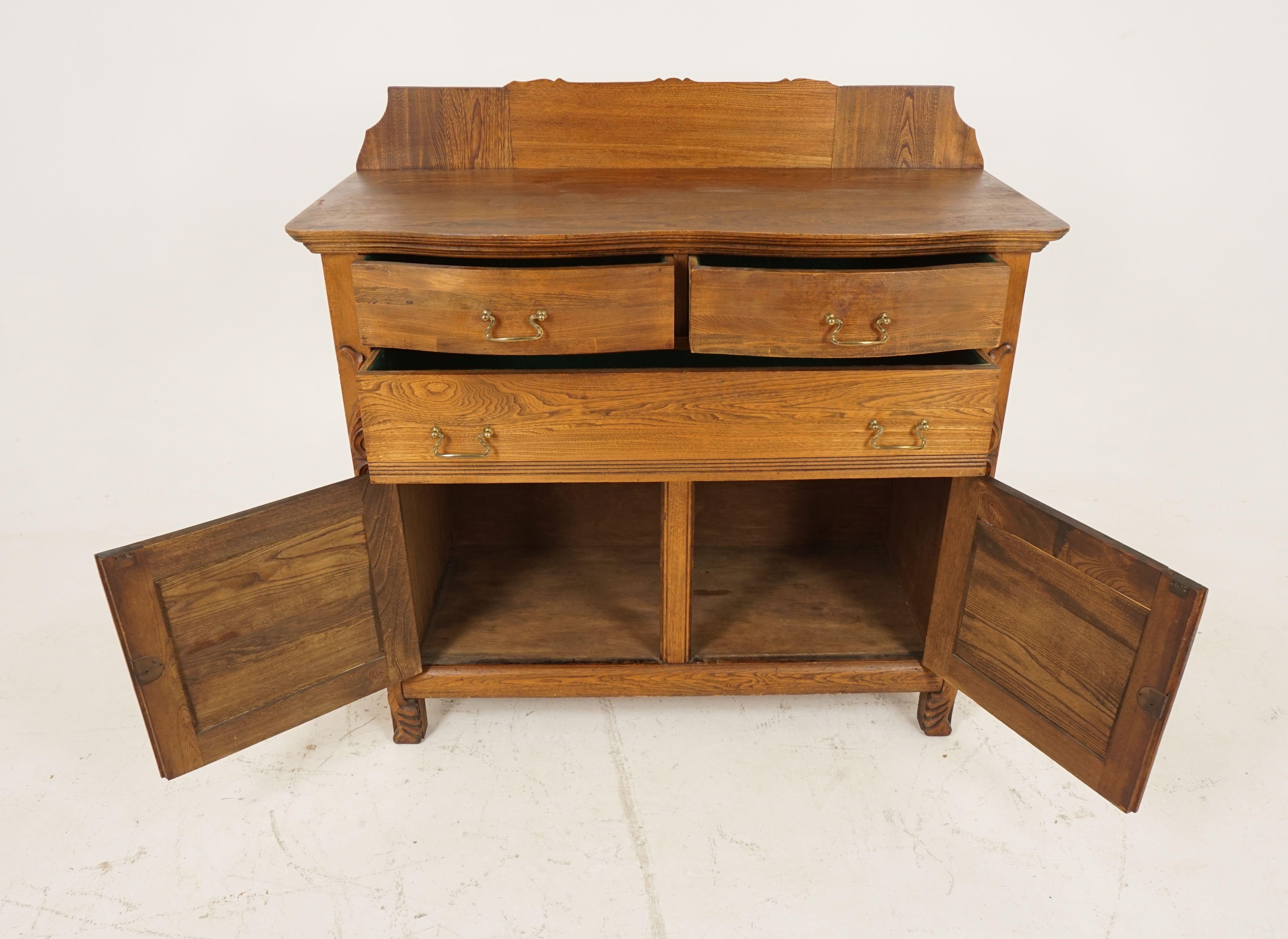 Antique ash sideboard, serpentine front sideboard buffet, American 1900, B2106

American, 1900
Solid ash
Original finish
Gallery back
Serpentine top
Pair of lined dovetailed drawers
Full length lined drawers underneath
Pair of paneled