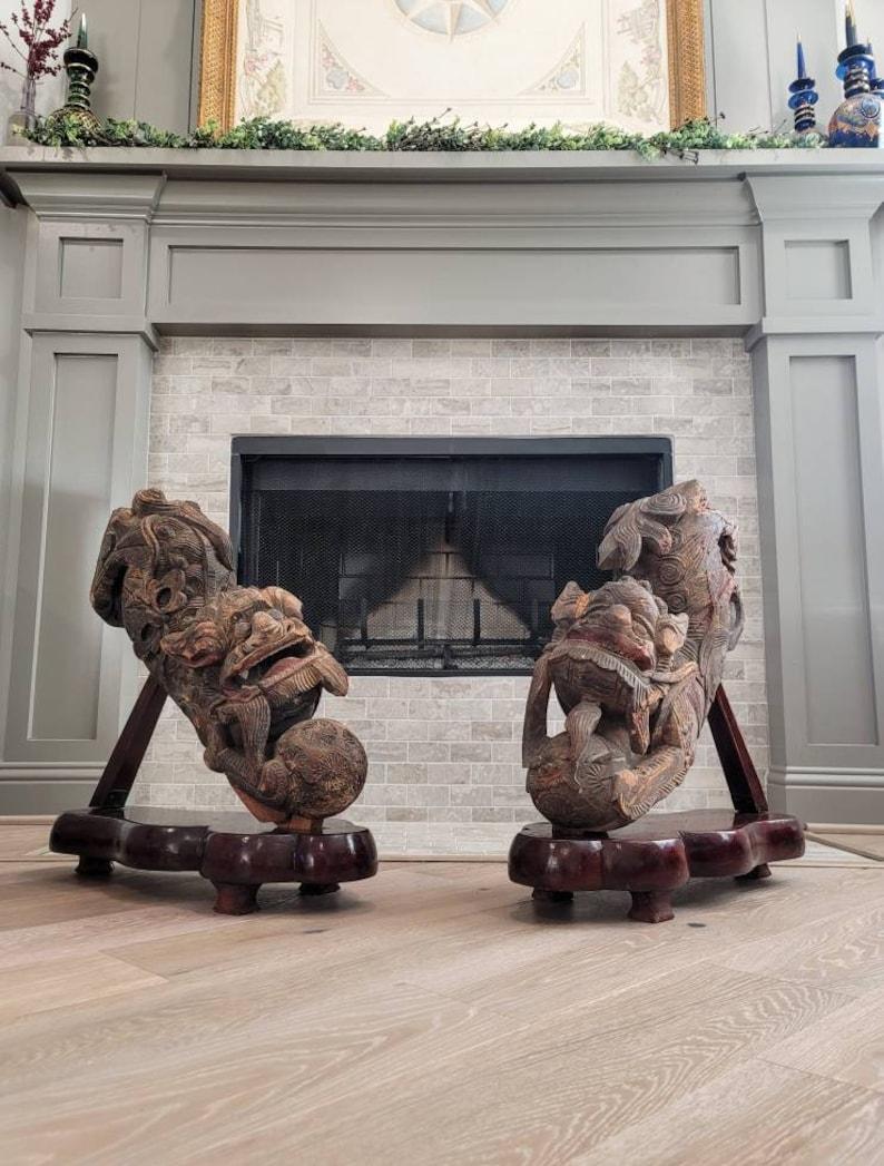 A magnificent pair of Qing Dynasty (1644-1912) antique Chinese architectural elements with beautifully aged patina. circa 1900

Most impressive large scale, likely sculptural corbels from a Buddhist temple or imperial palace, late 19th / early 20th