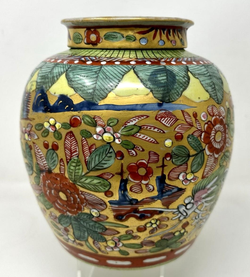 Rare and important Chinese Export Ginger Jar of medium proportions, late Nineteenth, early Twentieth Century, complete with original firm fitting cover. 

Exquisitely hand decorated in colours of various greens and iron reds on a very unusual gilt