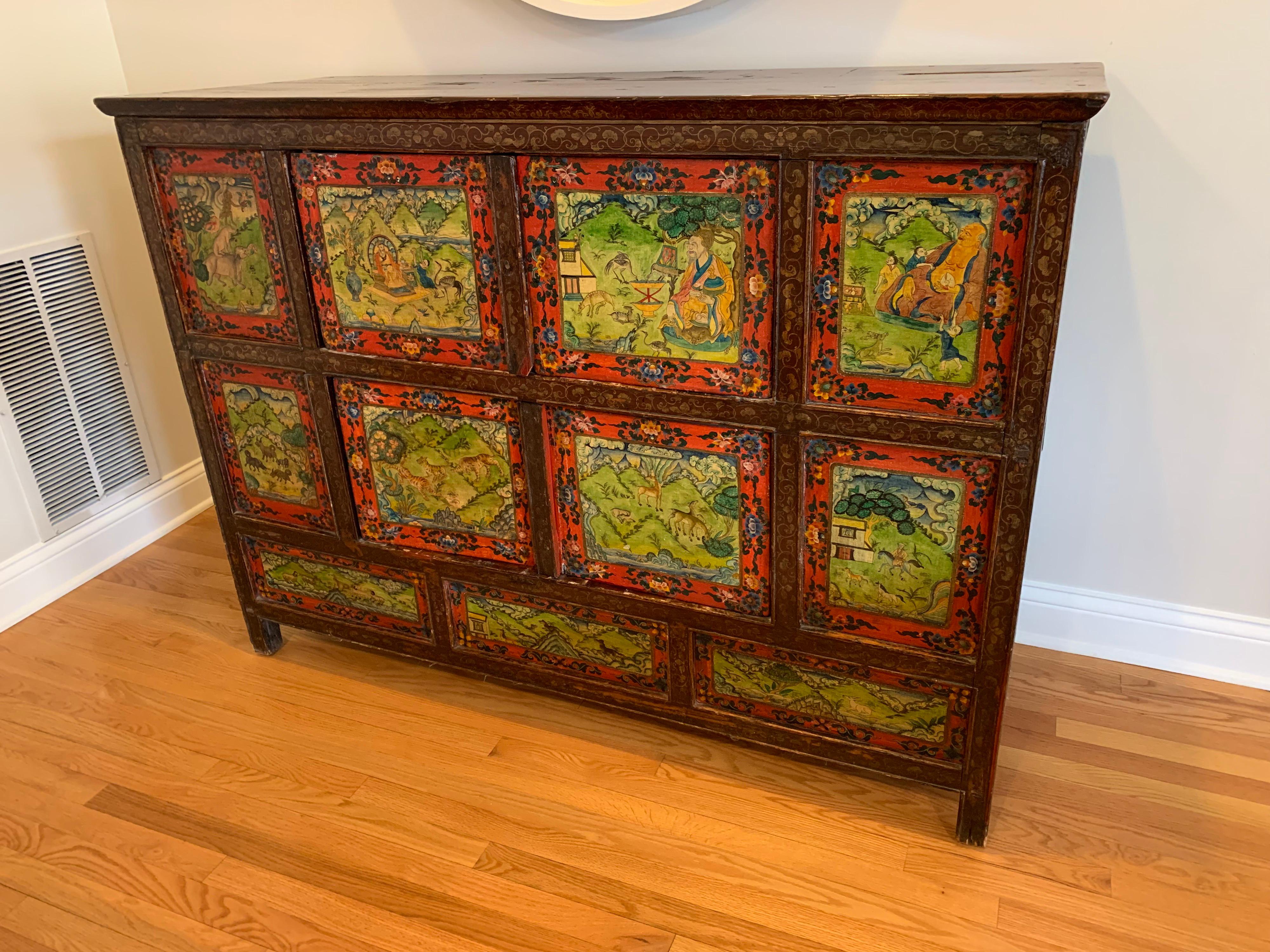One of a kind piece
purchased for $5200 from Golden Triangle, each panel is different and hand painted. four panels open for cabinet storage. Solid teak top with rustic impressions. Fabulous and one of a kind piece measures: 60 x 23 x 42.