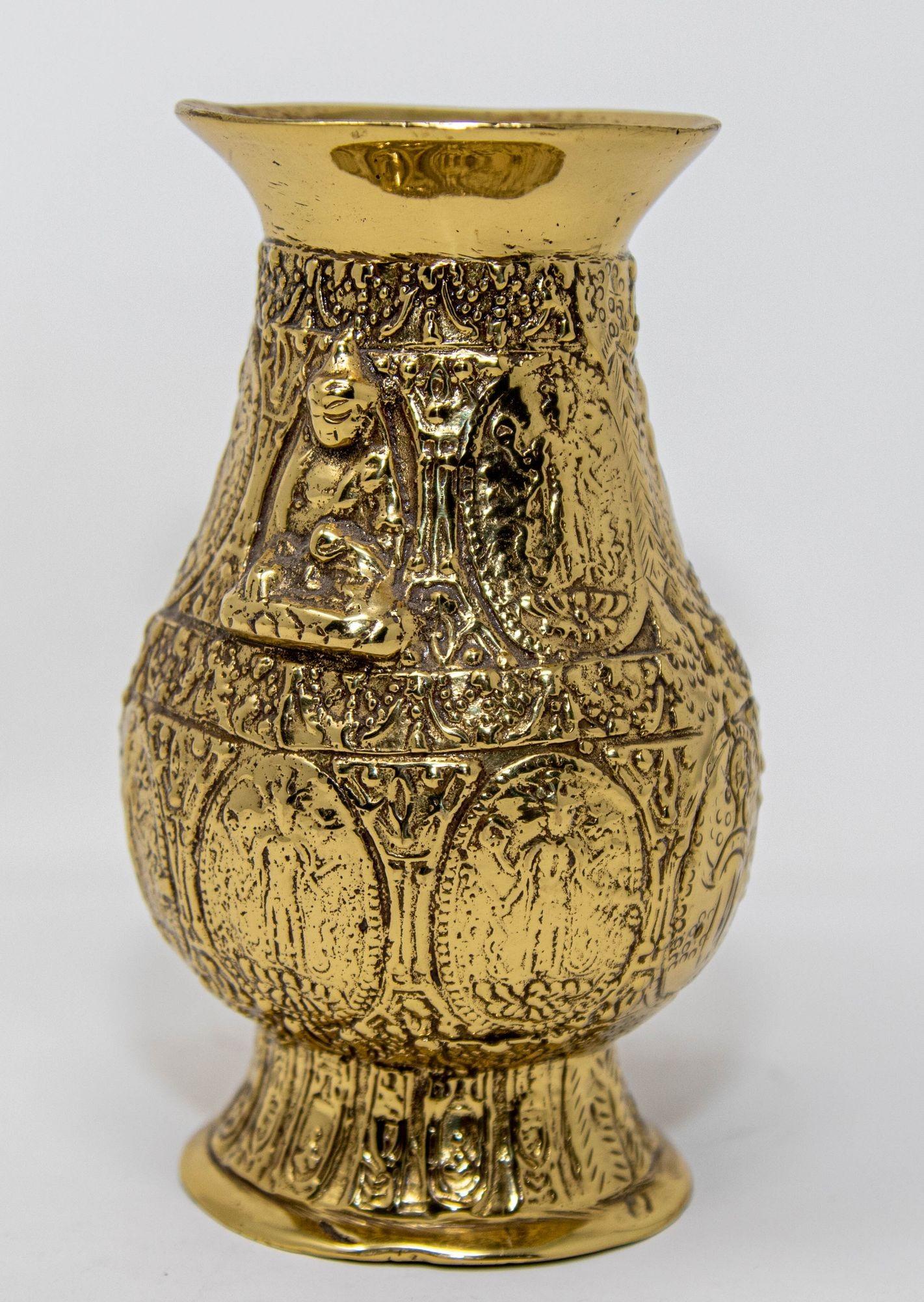 Antique polished Asian brass Ashta Lakshmi Hindu pot, intricately embossed with the figures of the eight manifestations of Devi Lakshmi, the revered Hindu goddess of wealth.
Each of these eight forms represents a unique source of prosperity,