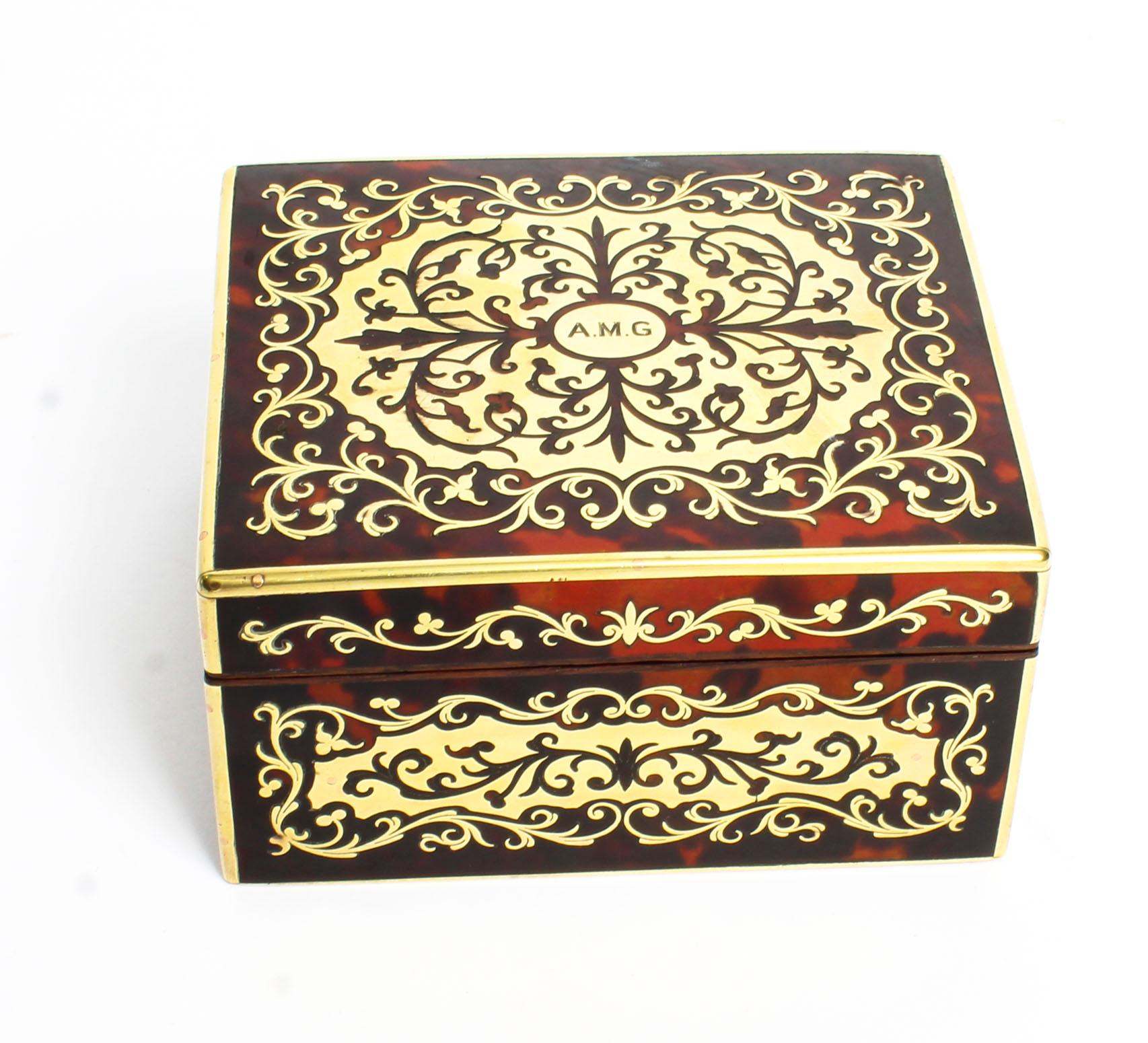 This is a lovely Victorian red boulle and cut brass marquetry casket from Asprey London, circa 1870 in date.

The interior is lined with cedar and is ready to store your precious items.

The lid inscribed with the initials 'A.M.G', the bases