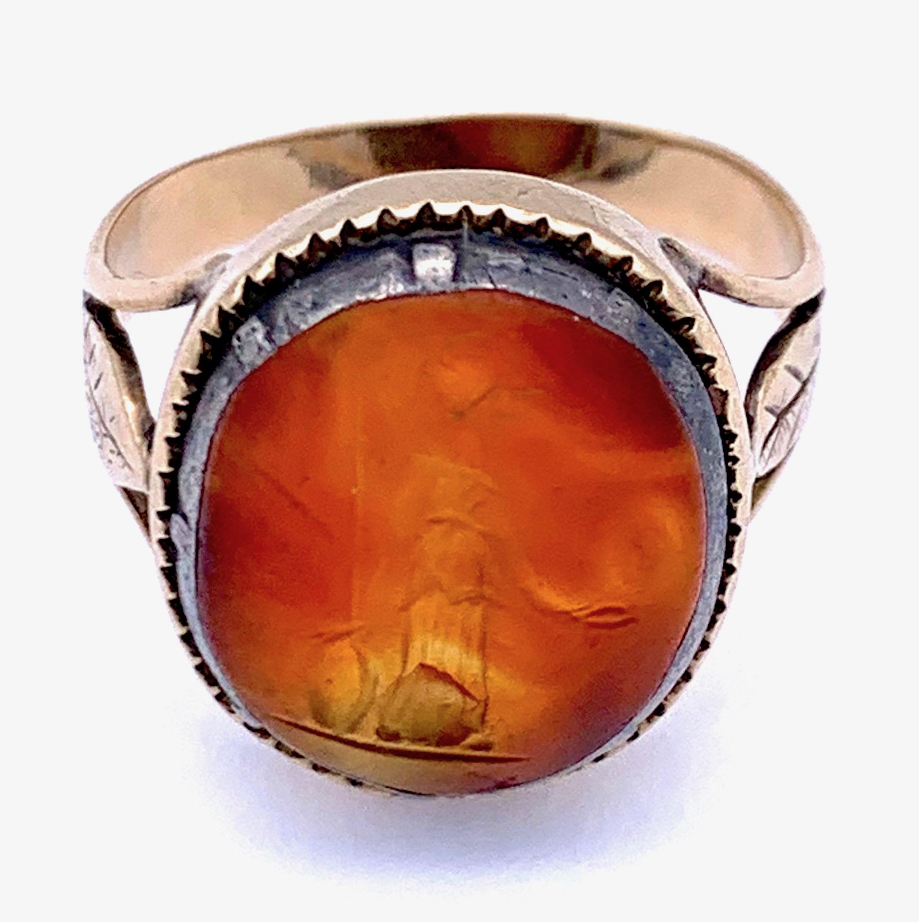 Oval roman intaglio of Athena mounted in a late eighreenth century ring made out of  silver and gold.

ring size : US 7.5 Europe 56