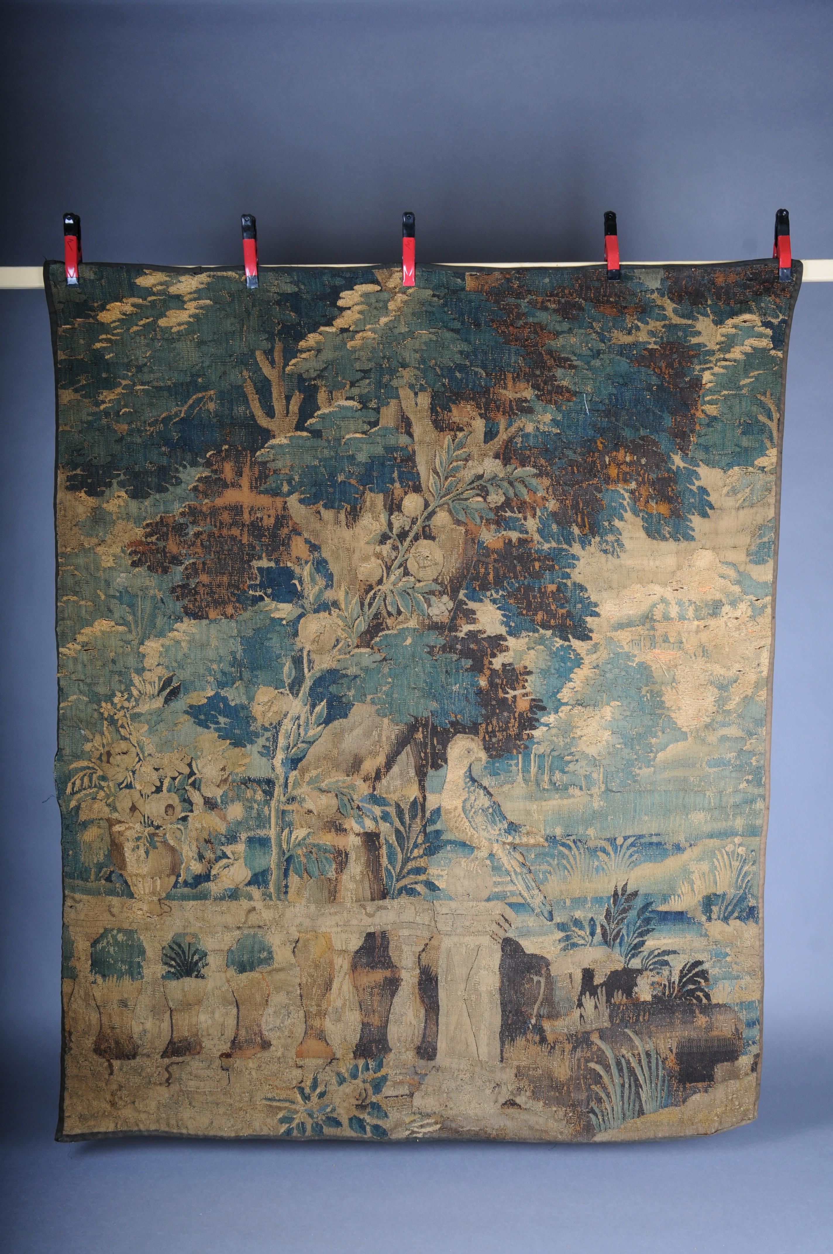Antique Aubosson/Gobelein wall carpet, France late 17th century. Verdure motif, silk

Antique Musael Aubosson tapestry made of silk and partly wool. Very fine and antique design. Depicting: Verdure - tapestry depicting plants in green colors. A very