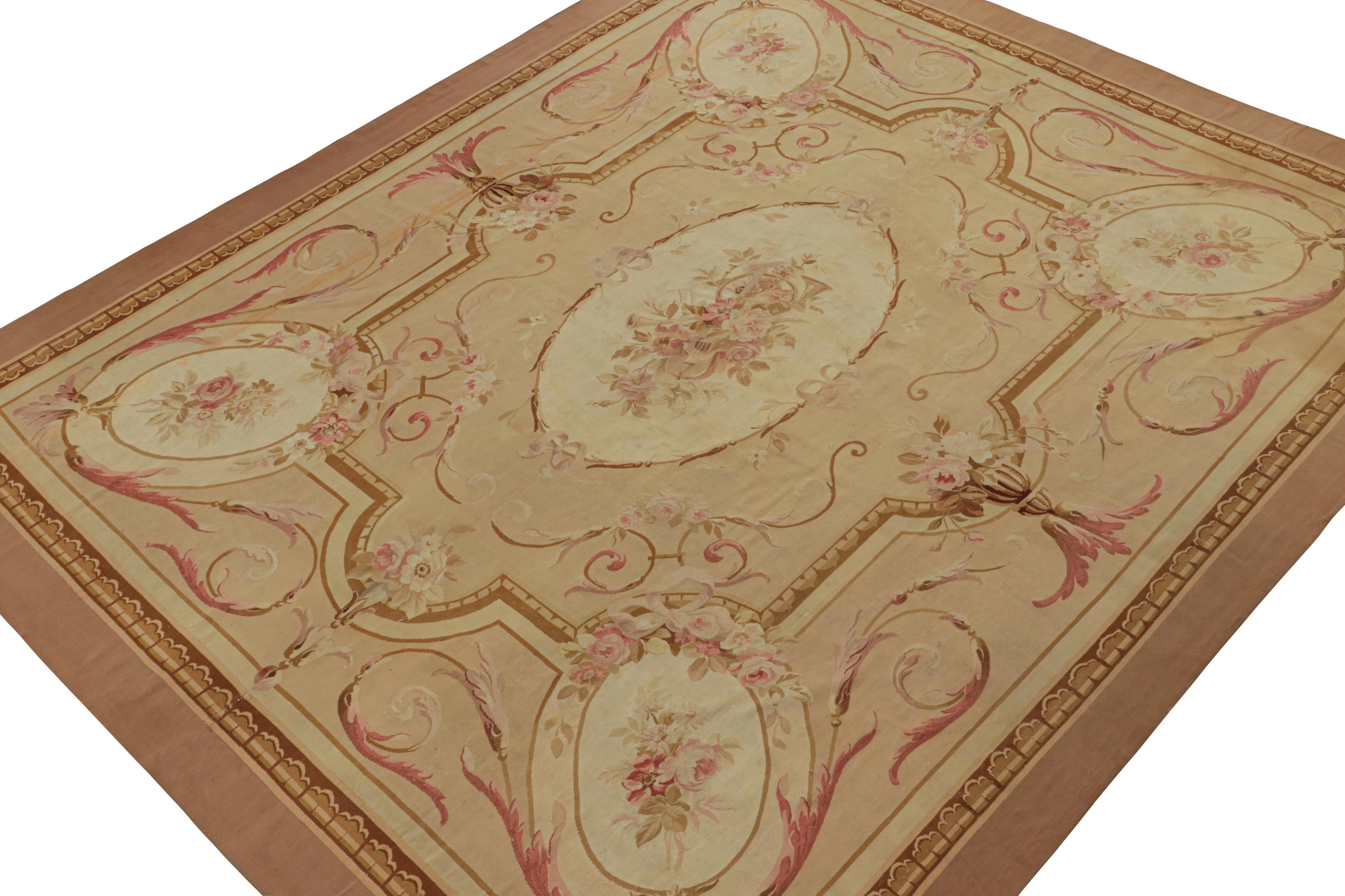Handwoven in wool circa 1890-1900, this 10x11 antique Aubusson flatweave rug enjoys beige and pink tones with finely detailed cartouches and floral patterns in the transitional French tapestry weave style. 

On the Design: 

Admirers of Aubusson