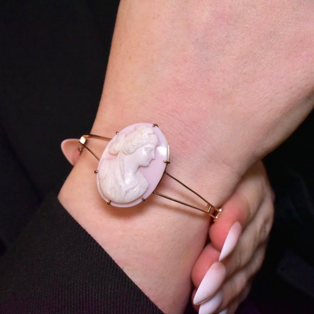  This all original, early Australian Conch Shell Cameo bangle is beautifully crafted in 9ct rose gold and fully hallmarked for A. Benjamin And Sons, an early Australian jeweller we seldom see pieces by in todays antique market.

Rather than being