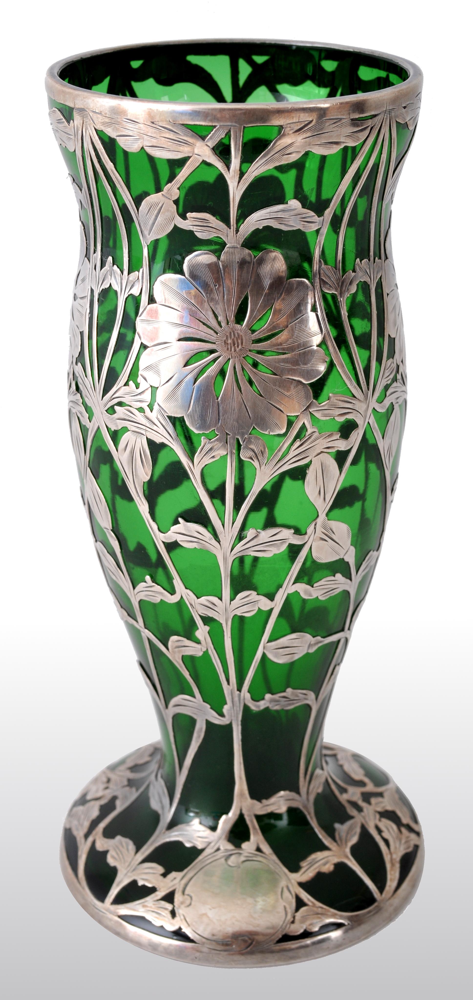 Antique Austrian Art Nouveau Loetz silver overlay glass vase, circa 1900. This elegant vase having a green glass body of baluster form and sumptuously overlaid with engraved silver floral design. The vase is marked to the foot with a sabre and