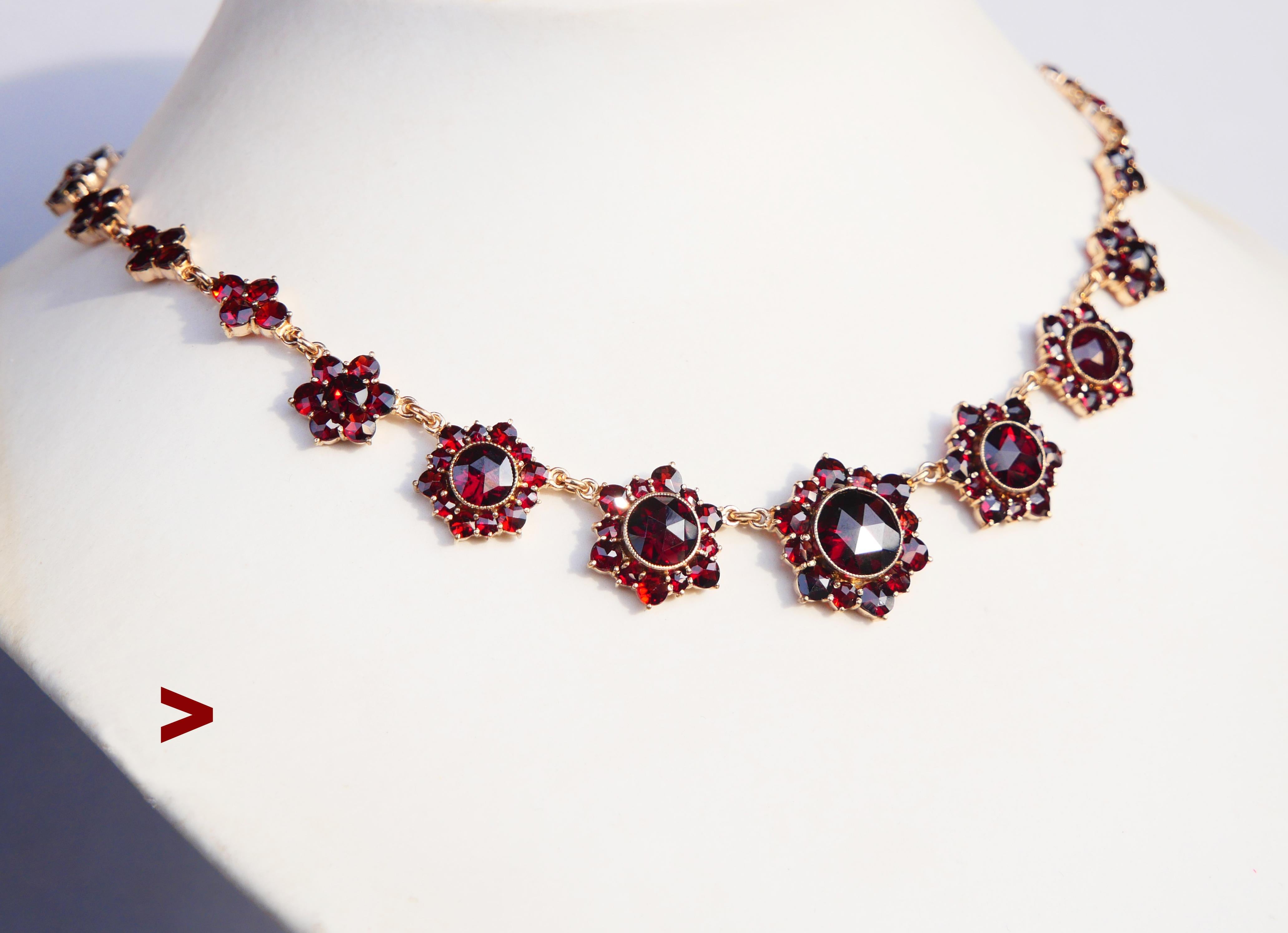 Bohemian ca. early 20th century Austrian /or Czech Bohemian Garnet Necklace. 

No hallmarks. Metal parts made of gilded Silver. All blood Red Bohemian Garnets are rose cut, both bezel and cluster set. All stones have open backs. Secure original 