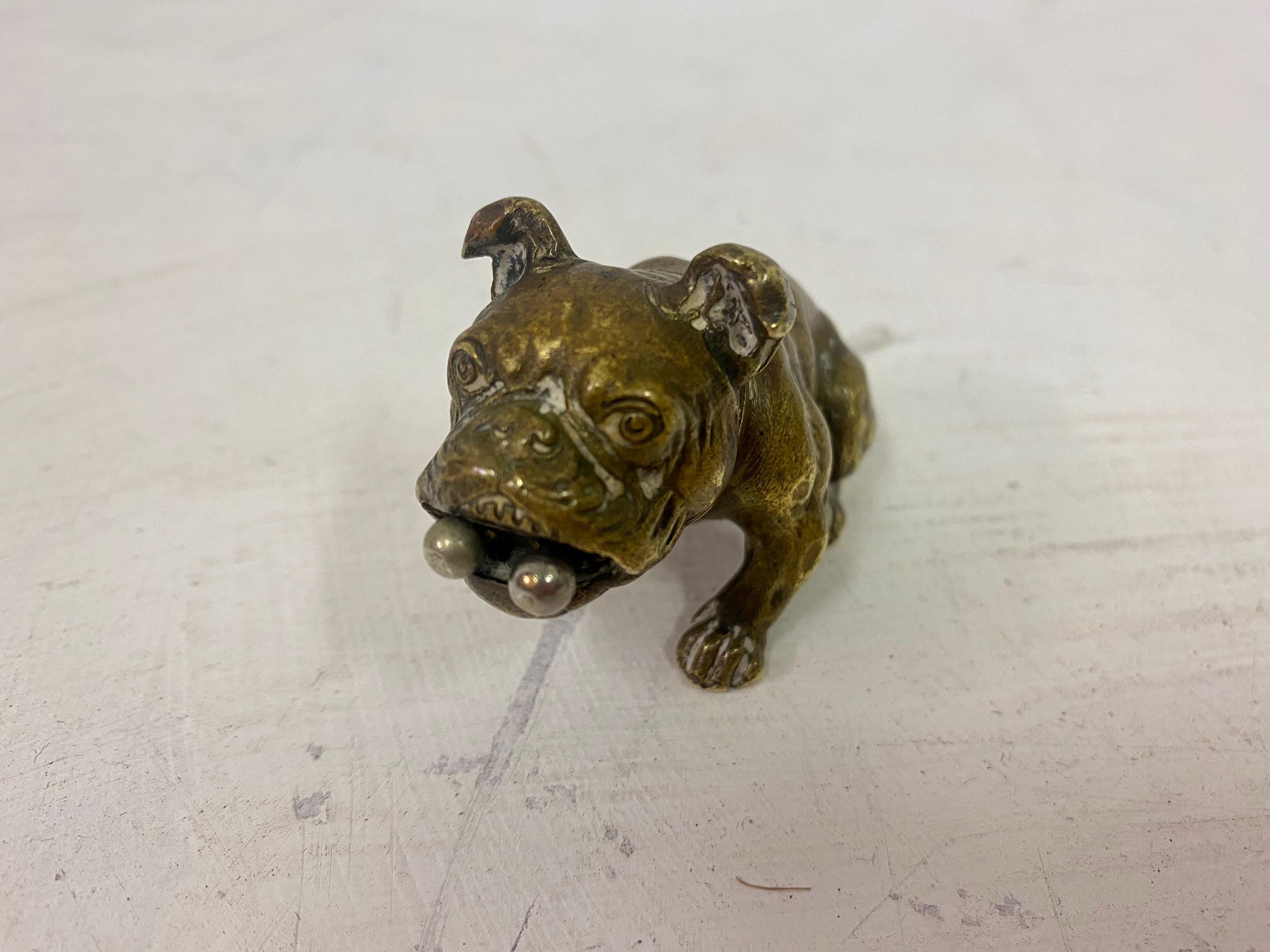 Cigar cutter

Shaped as a sitting bulldog

Bronze

Stamped Austria on paw

Cutter extends and retracts from mouth

Austria early 20th century.