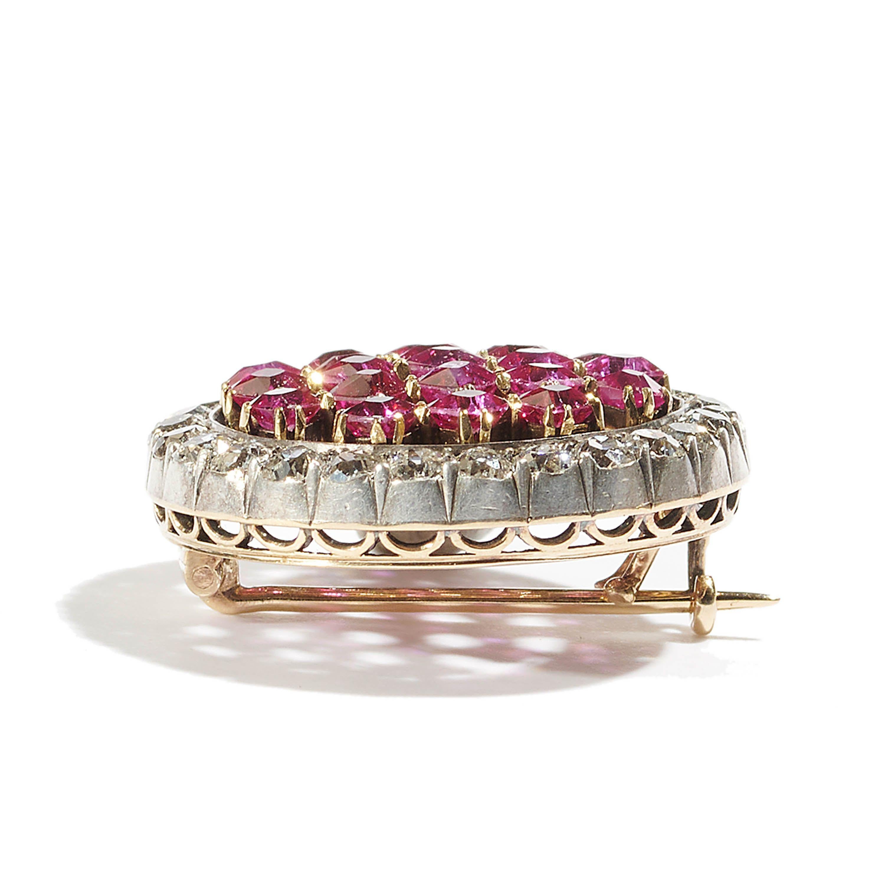An antique, Austrian, Burma ruby and diamond chequerboard brooch, with French-cut rubies, in claw settings, surrounded by old-cut diamonds, in silver cut down settings, mounted in gold, with Austrian marks, circa 1890.