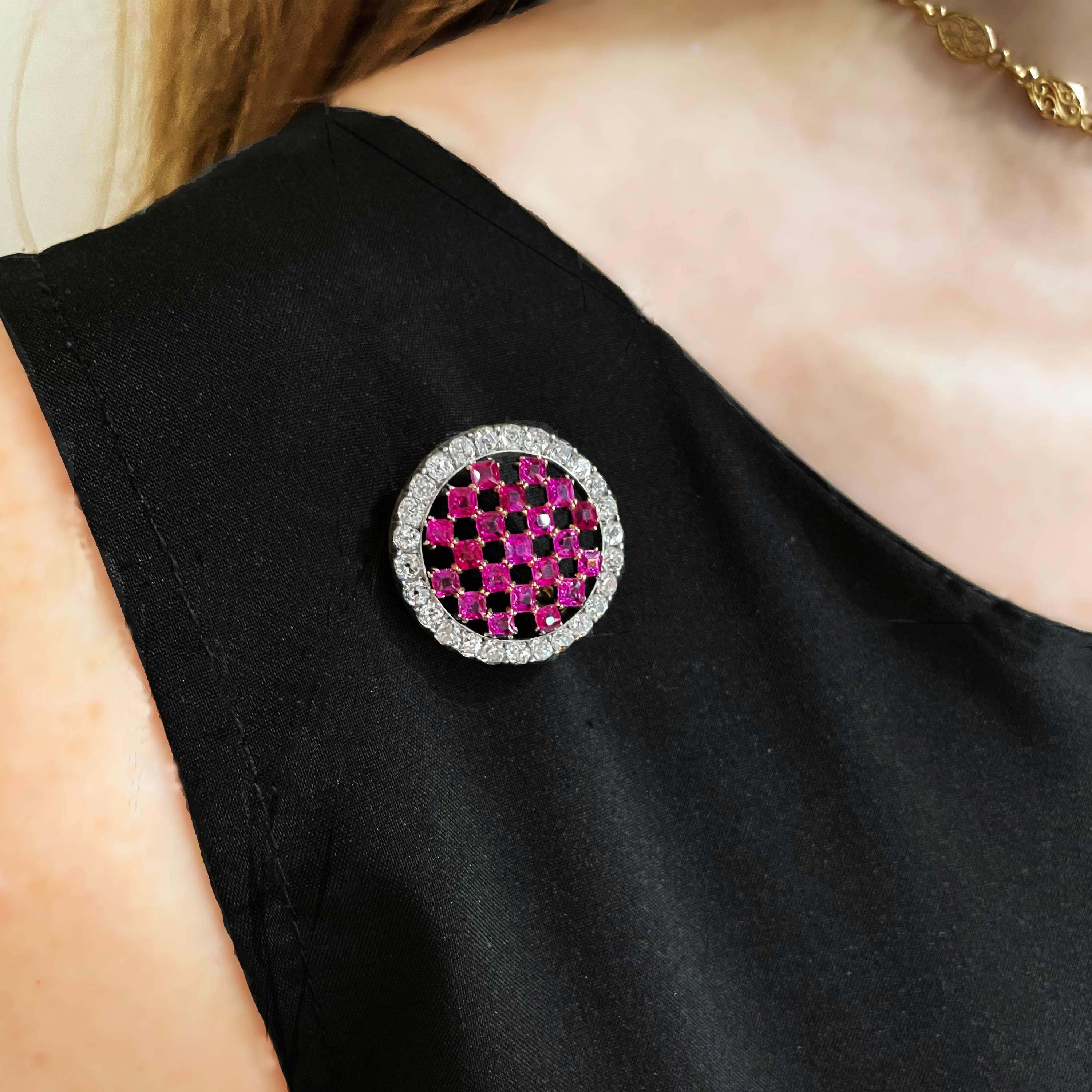 An antique, Austrian, Burma ruby and diamond chequerboard brooch, with French-cut rubies, in claw settings, surrounded by old-cut diamonds, in silver cut down settings, mounted in gold, with Austrian marks, circa 1890.