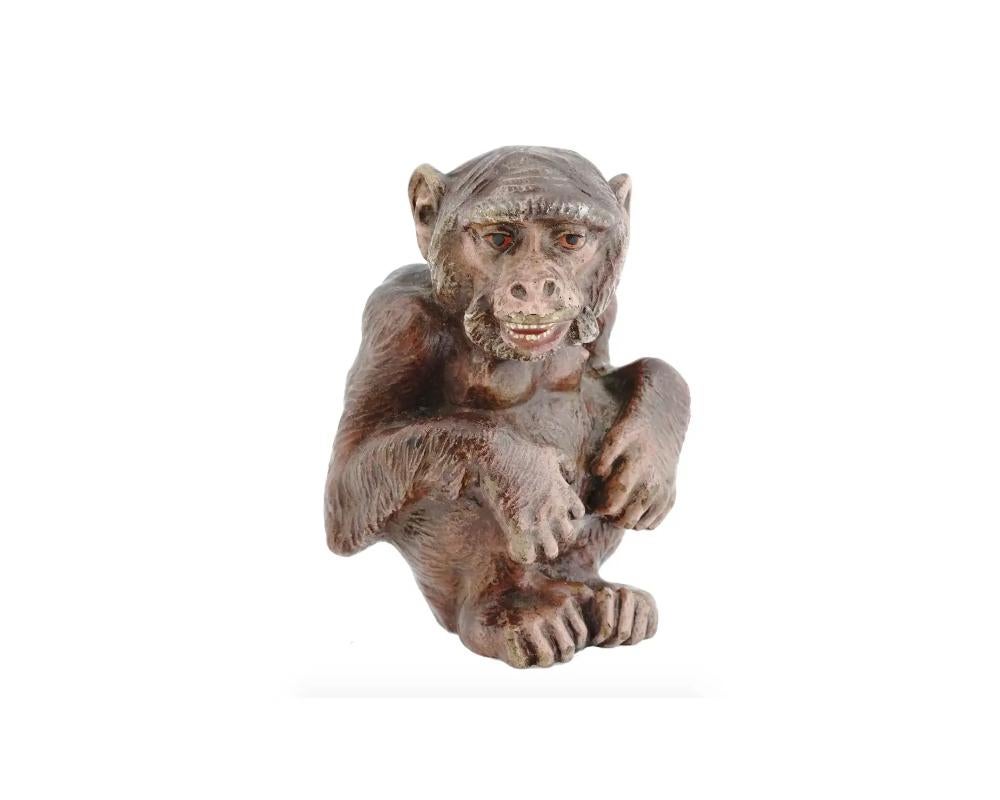 An antique late 19th to early 20th-century Austrian cold-painted cast bronze figurine of a seated monkey. Unmarked. Collectible Vienna Bronze, Oriental Decor For Interior Design.

Dimensions: H 4 in. All measurements are