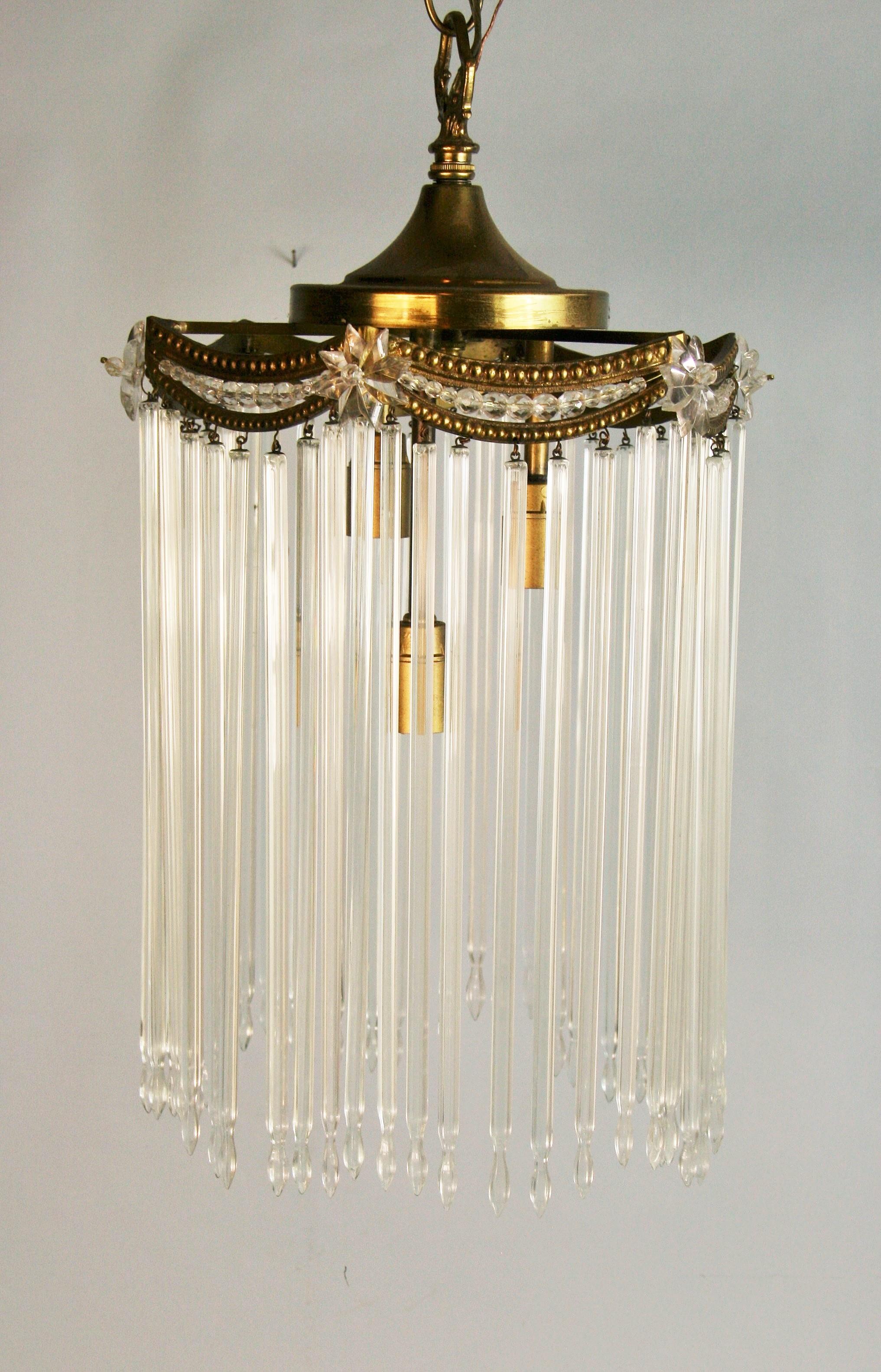 1612 Antique  three internal light Austrian crystal pendant.
Takes 3 40 watt candelabra based bulbs
Rewired.