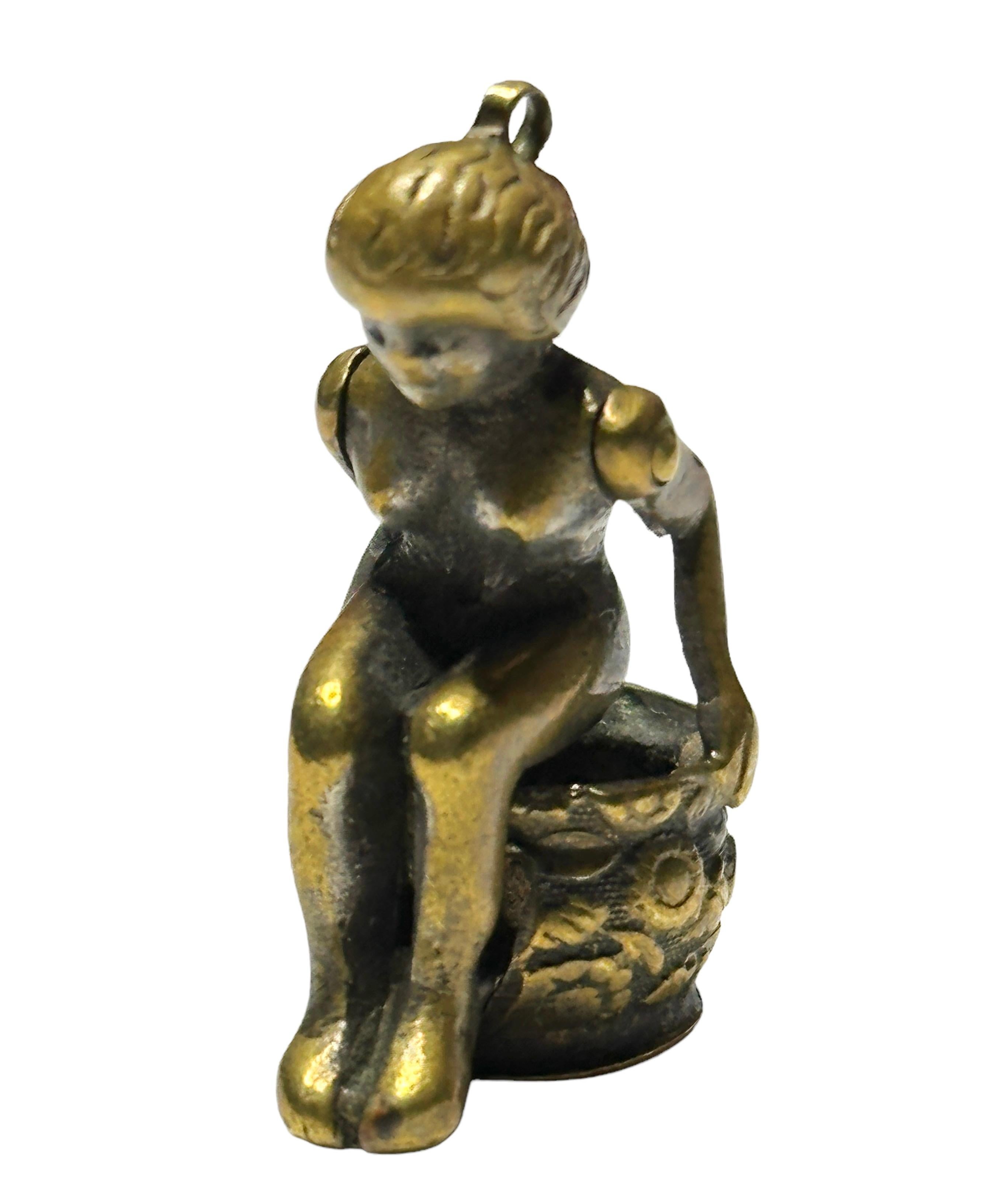 A beautiful cigar cutter, showing a lady on a chamber pot. Some wear with a nice patina, but this is old-age. Made of bronze and metal. A beautiful nice collectible item or just a display item near your humidor or at your pocket watch chain. Found