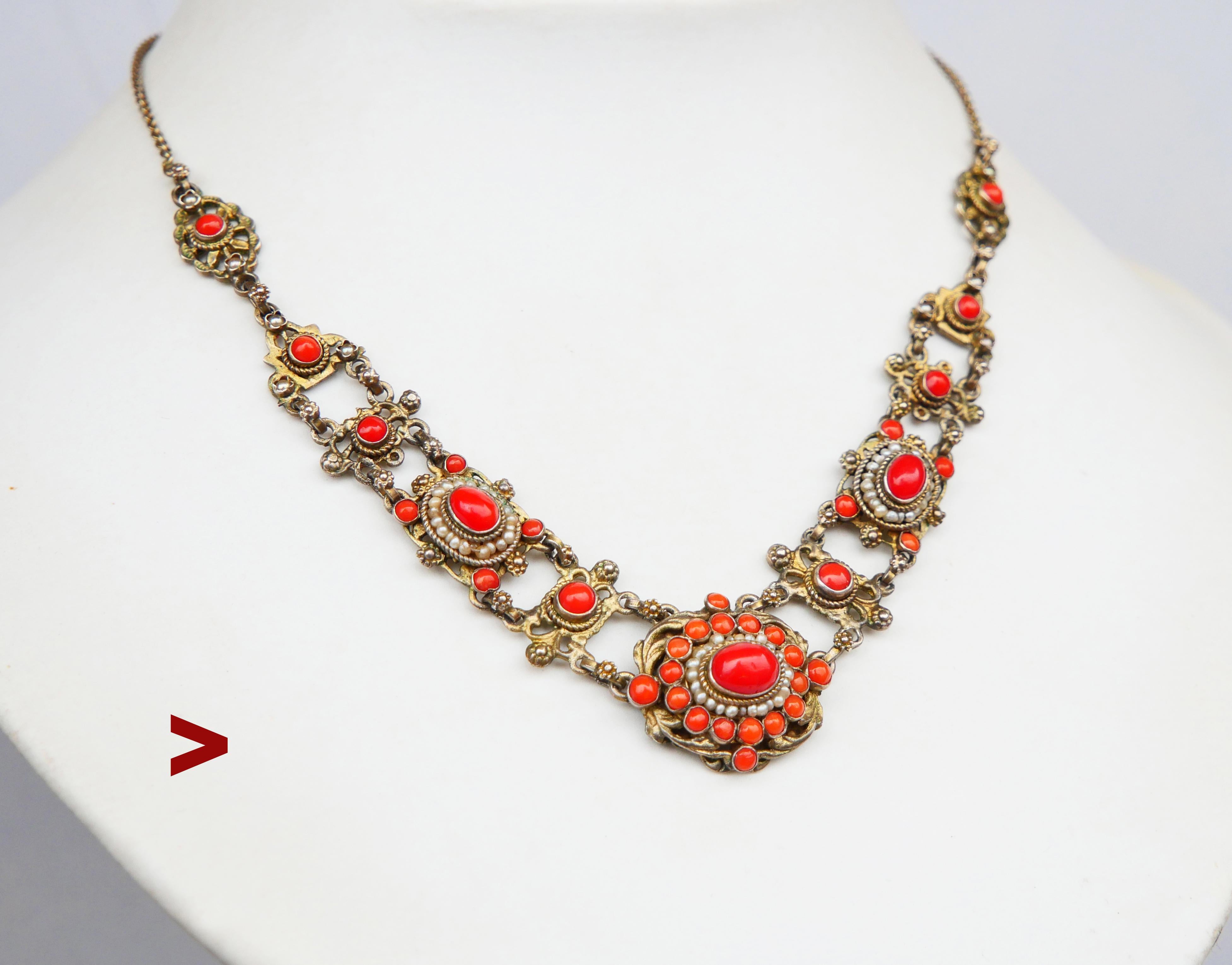 Rare and striking Renaissance Revival Austrian Necklace. Complexly structured and one-of-a-kind design, lavishly decorated with natural polished Red Coral cabochons and selected miniature Oriental Pearls. 

Hand - made ca.  late 19th  - early 20th