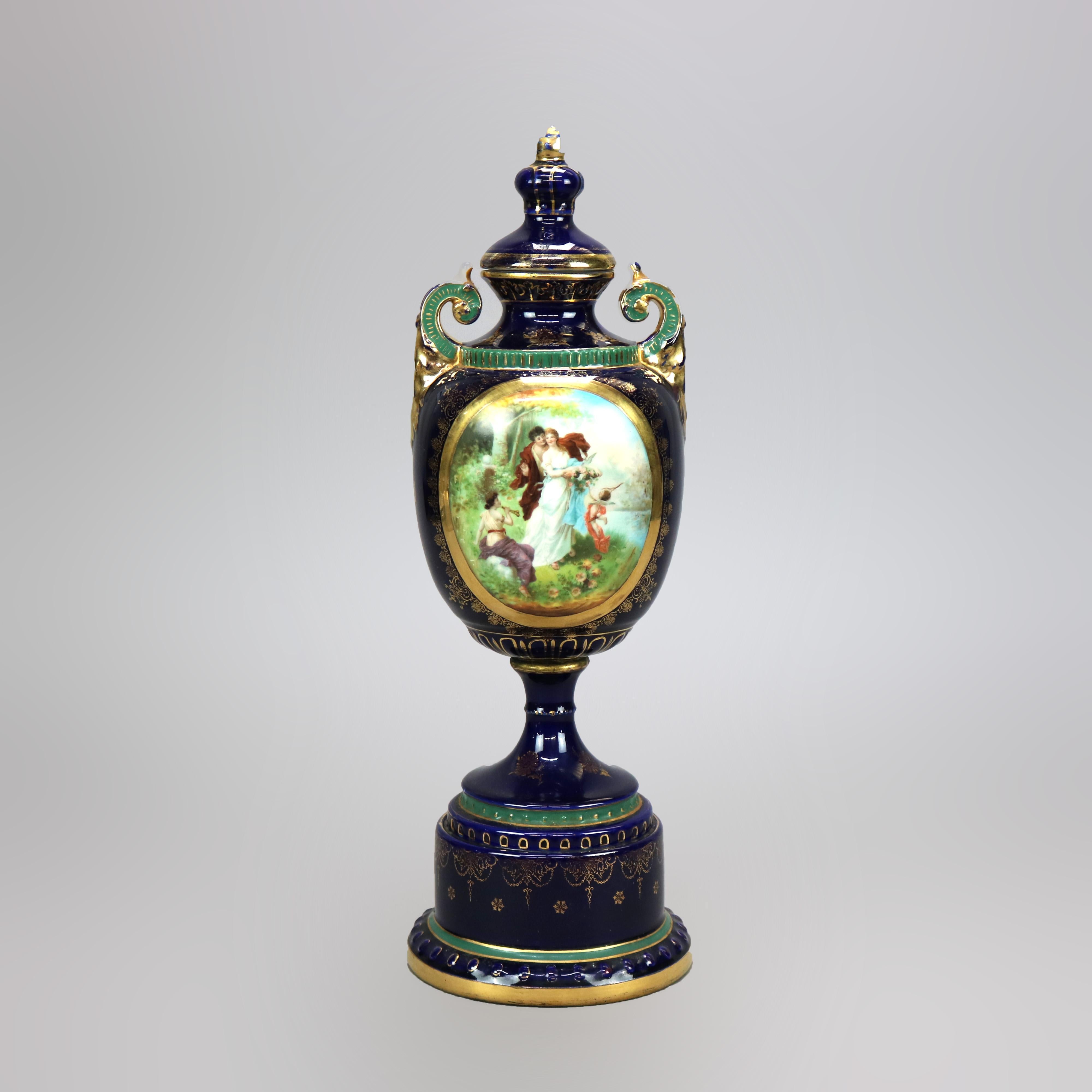 An antique Austrian lidded portrait urn by Royal Vienna offers porcelain construction having double scroll handles flanking a hand painted reserve depicting Neoclassical courting scene, raised on decorated plinth, gilt highlights throughout, beehive