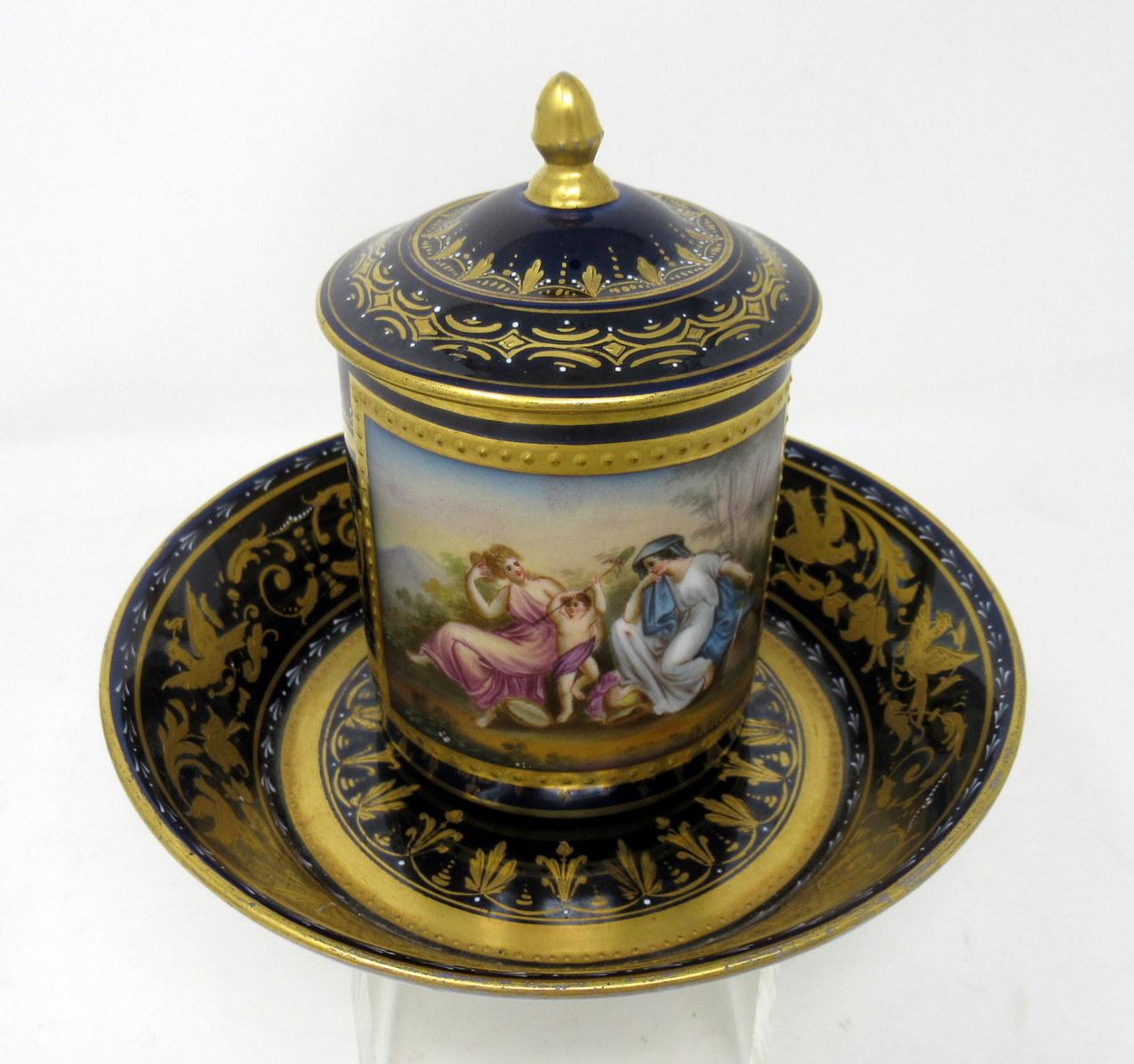 An exceptional Vienna Porcelain hand decorated chocolate cup with cover and circular stand of outstanding workmanship, of cylindrical form with bracket handle, circa last quarter of the 19th century. 

Exquisitely painted with Classical female