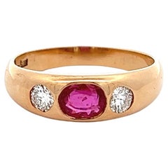 Antique Austrian Ruby Diamond 14 Karat Rose Gold Three Stone Band Ring