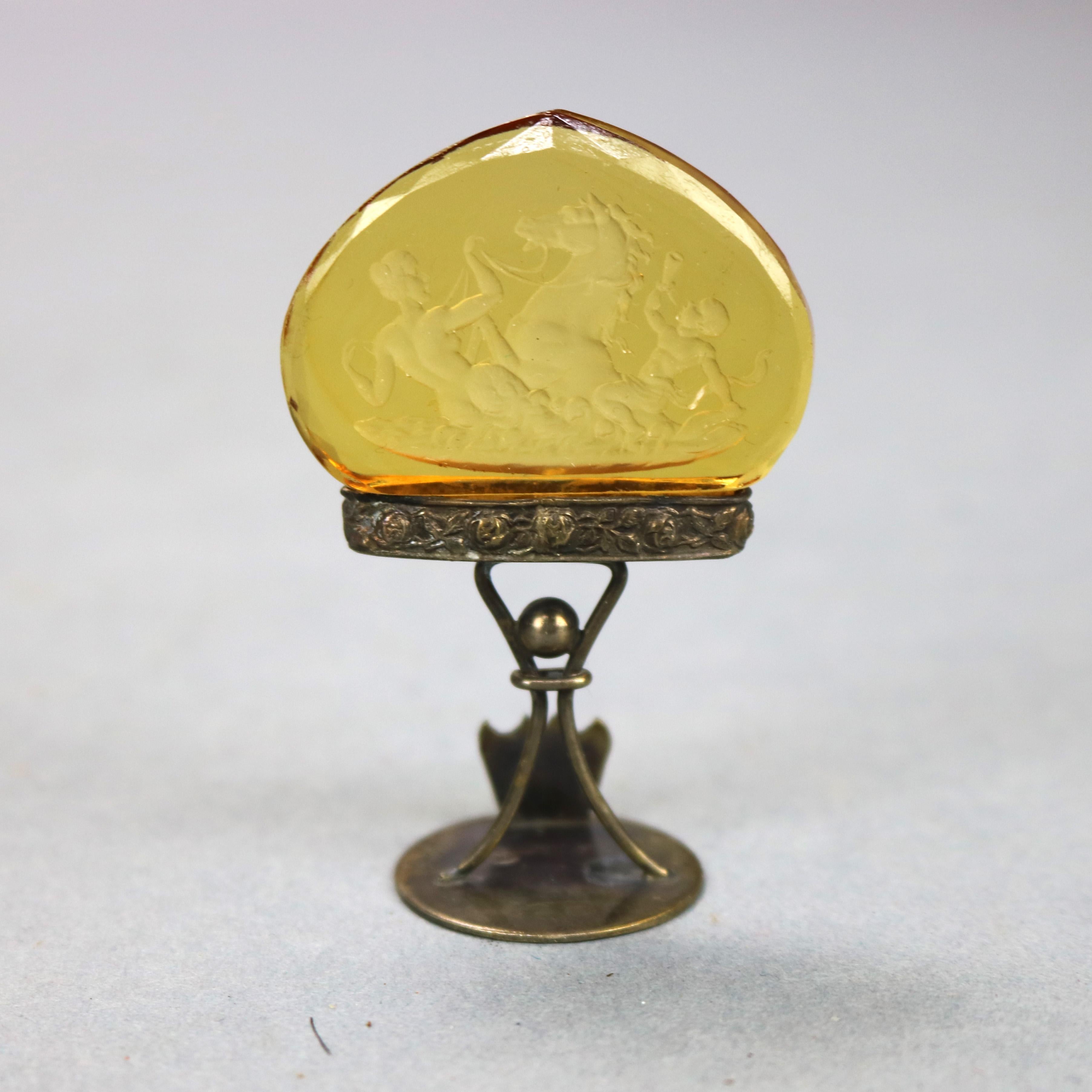 An antique set of twelve place card holders offer amber glass finials having Grecian scenes raised on figural sterling silver base with stylized man on round base, made in Austria stamped on base, 19th century
Set of sterling & crystal place card