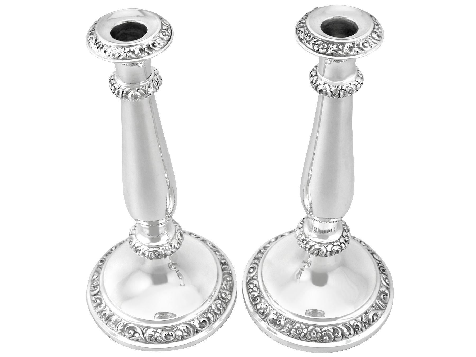An exceptional, fine and impressive pair of antique Austrian silver candlesticks; an addition to our continental silverware collection

These exceptional antique Austrian silver candlesticks have a circular rounded form.

The waisted shaped
