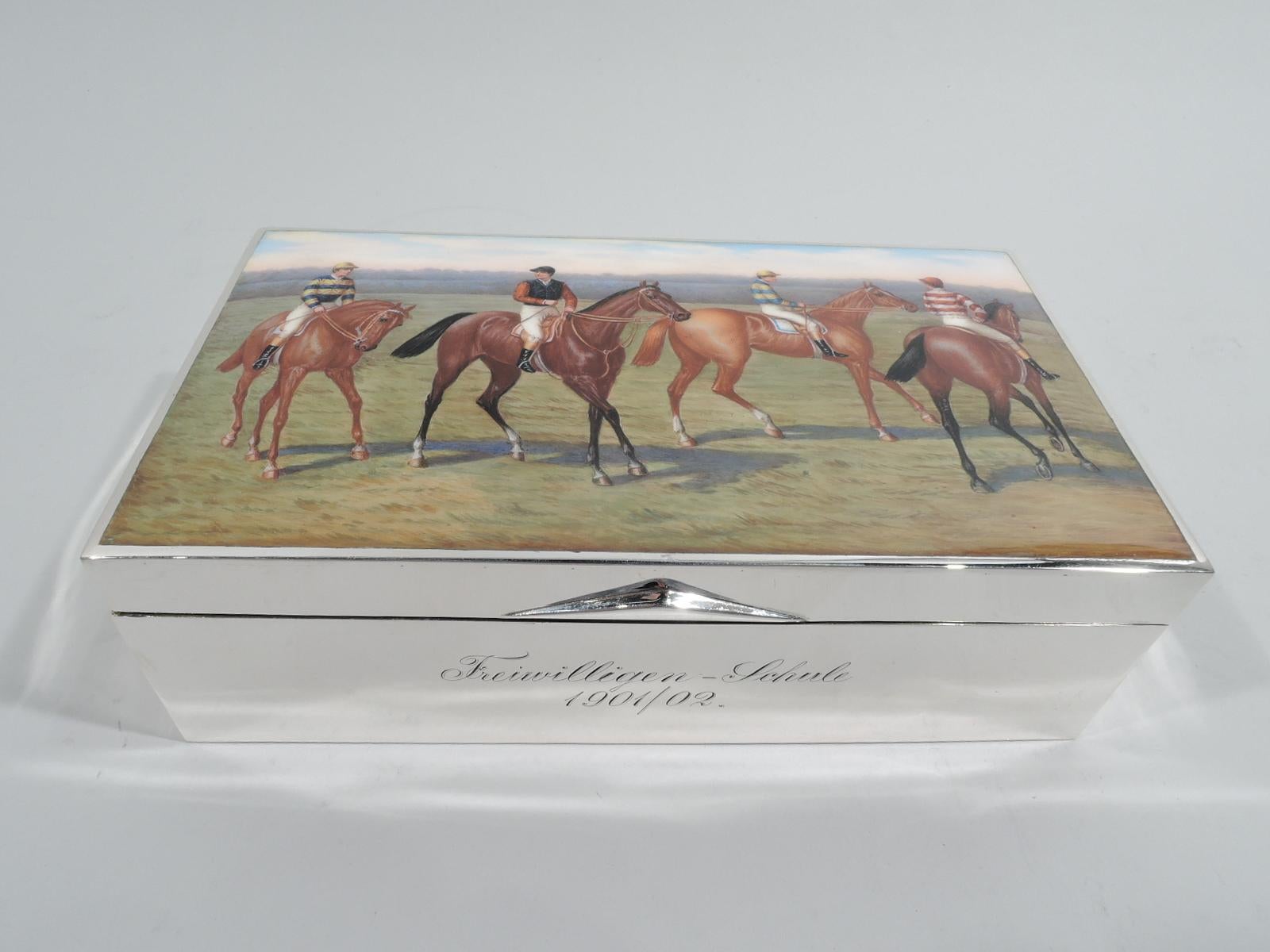 Turn-of-the-century Austrian 835 silver horse-themed box. Made by George Adam Scheid in Austria. Rectangular with straight sides. Cover hinged with triangular tab. On cover top is enameled scene with four mounted jockeys in bright silks, casting