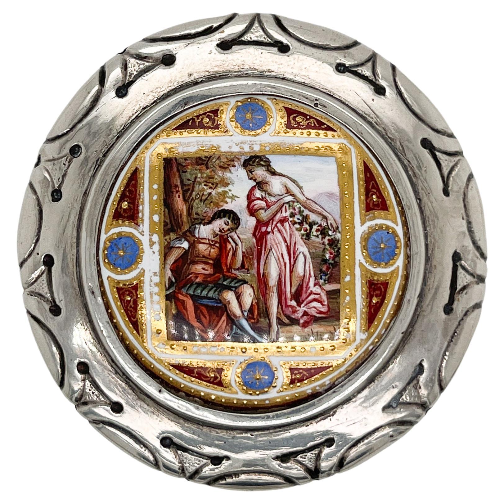 A fine Austrian silver & enamel snuff or patch box.

With a small enameled and gilt plaque set in the center of the top.

The plaque has a classical scene to the central cartouche and jeweled decoration throughout.

Simply a wonderful early