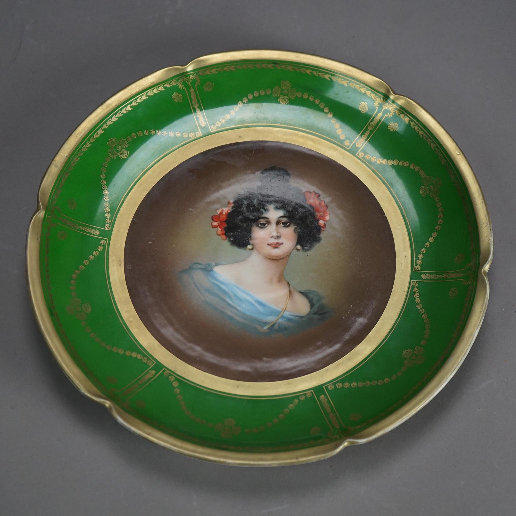 An antique Austrian Vienna Imperial PSL Porcelain Portrait Plate of a Woman; gilt highlights; maker mark en verso as photographed; C1920

Measures - .5