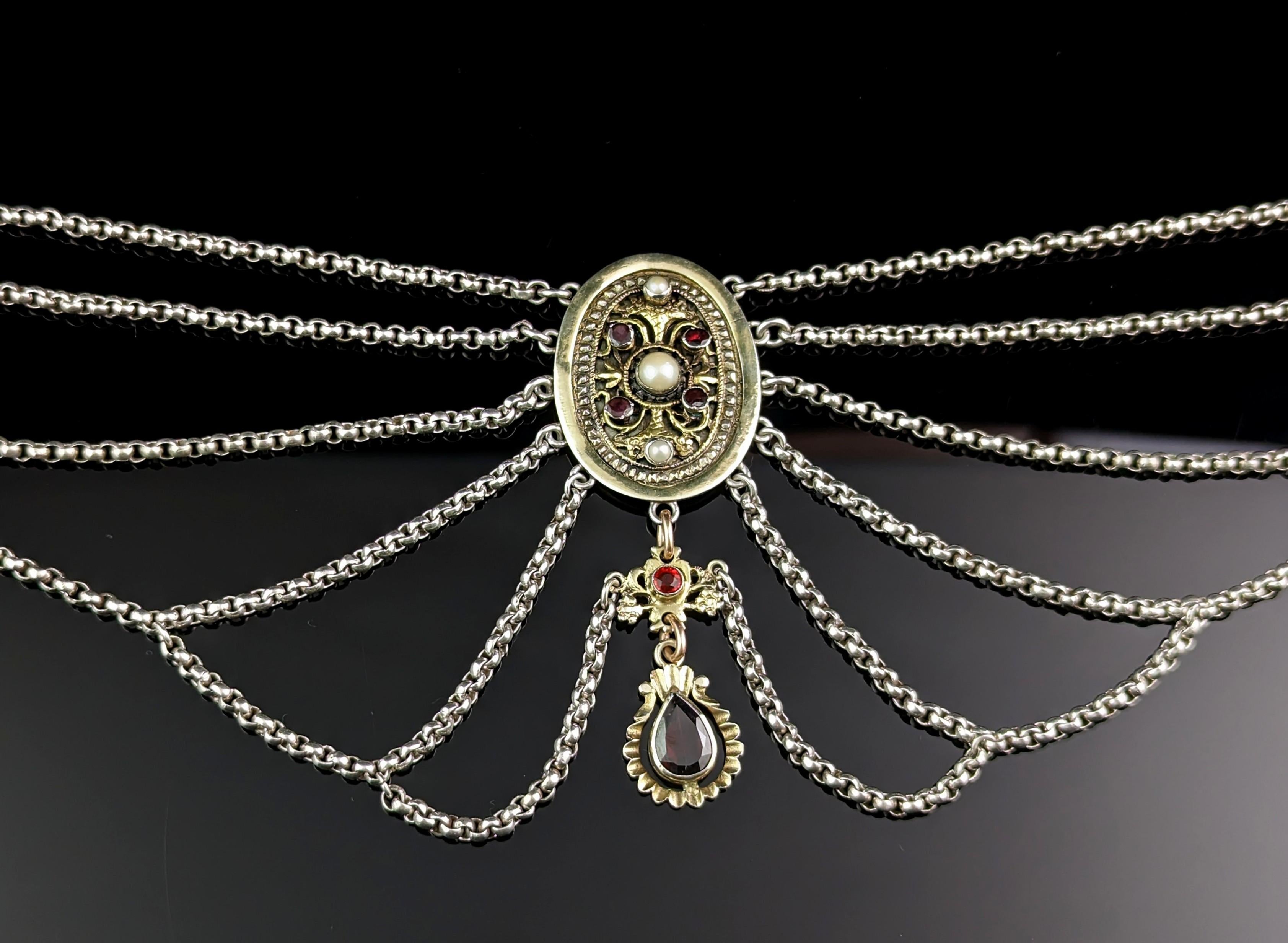 If you are a fan or collector of antique Austro-Hungarian jewellery then this one is for you!

This is an impeccable late 19th century Austro-Hungarian festoon or swag necklace, it has multiple rows of silver rolo link chain leading to the pendant