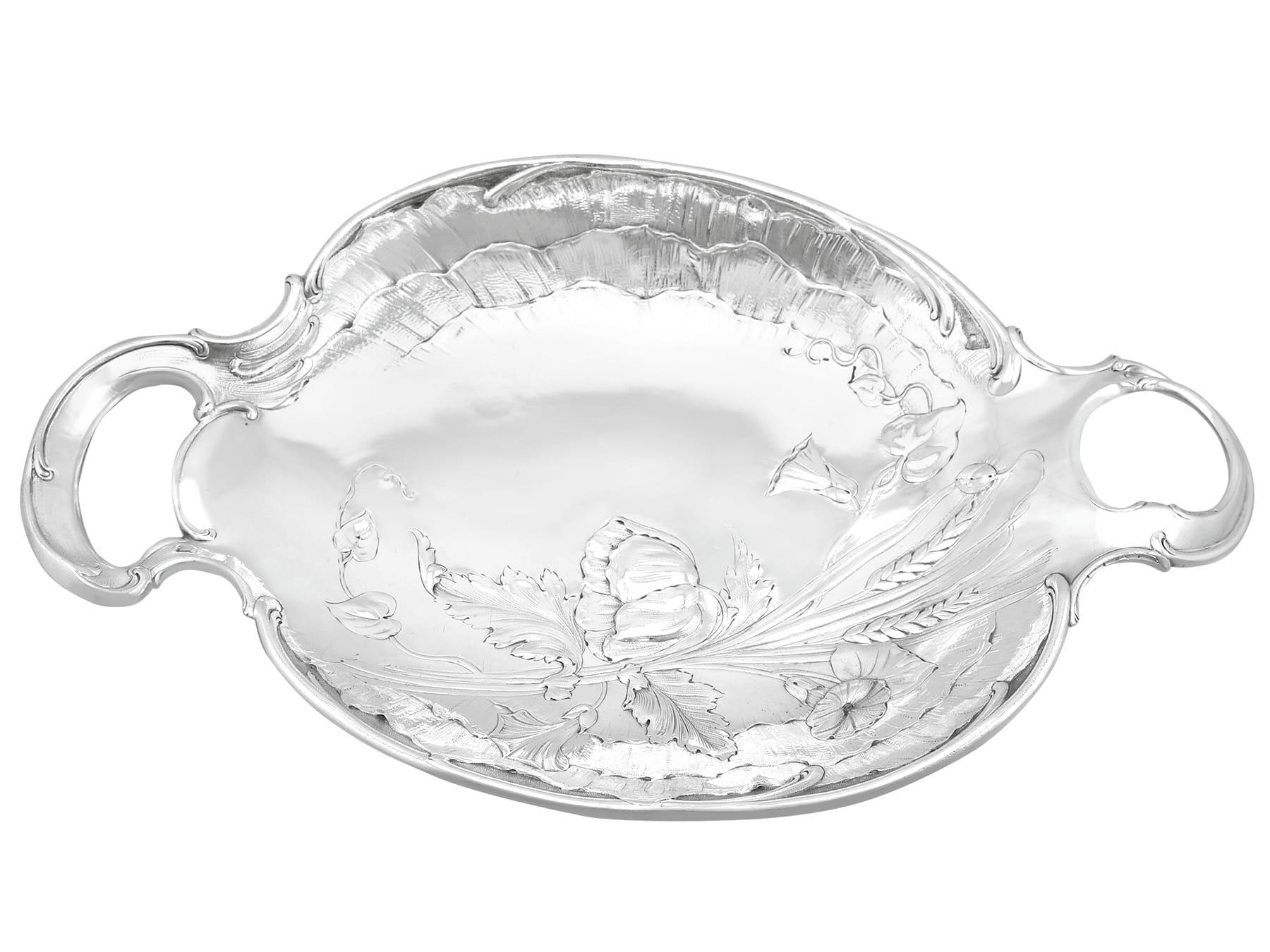 An exceptional, fine and impressive pair of antique Austro-Hungarian silver fruit dishes; an addition to our silver tableware collection.

These exceptional antique Austro-Hungarian silver fruit dishes, have an oval-shaped form.

The surfaces of