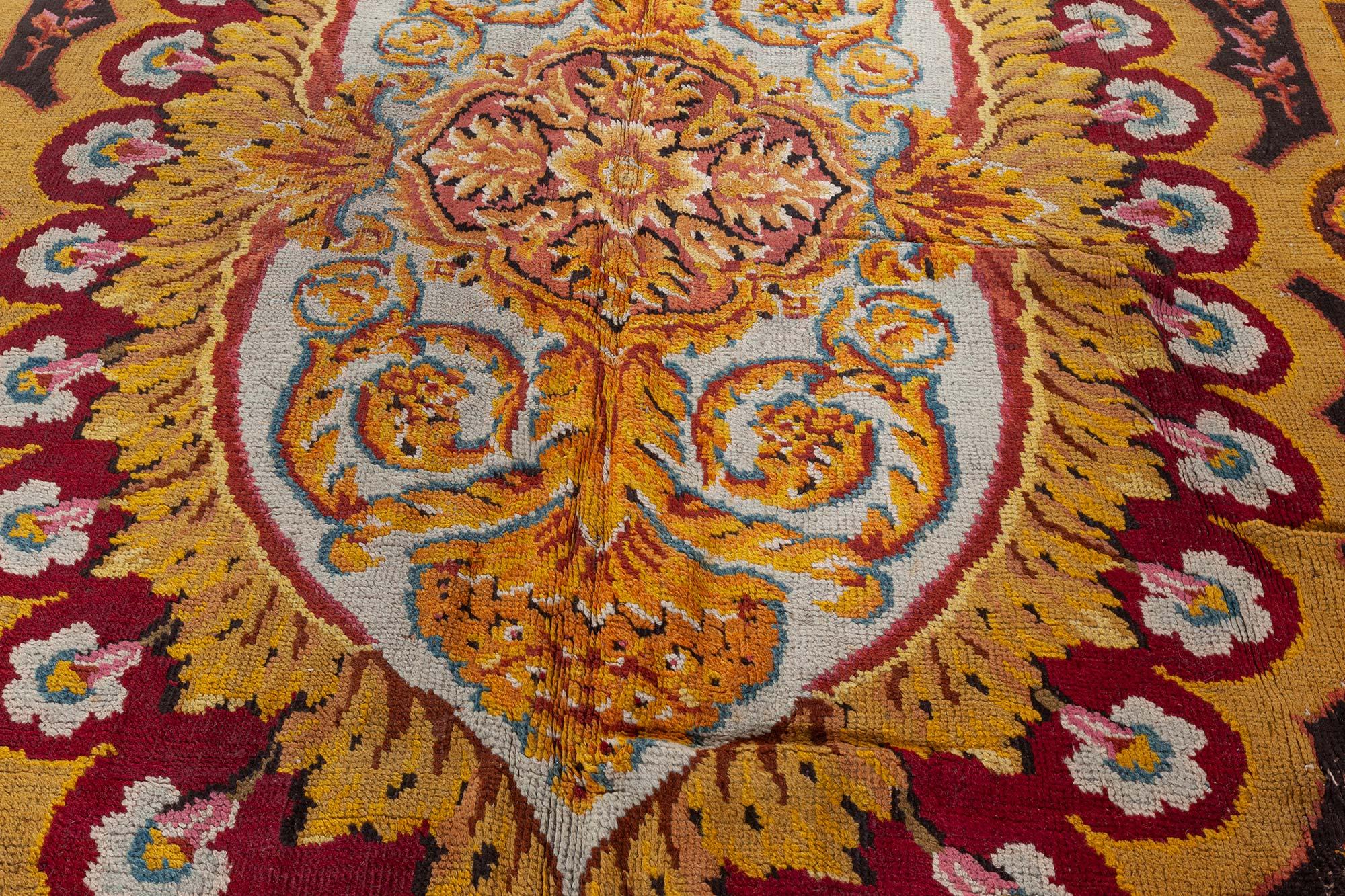 Antique Axminster botanic handmade wool carpet
Size: 14'4