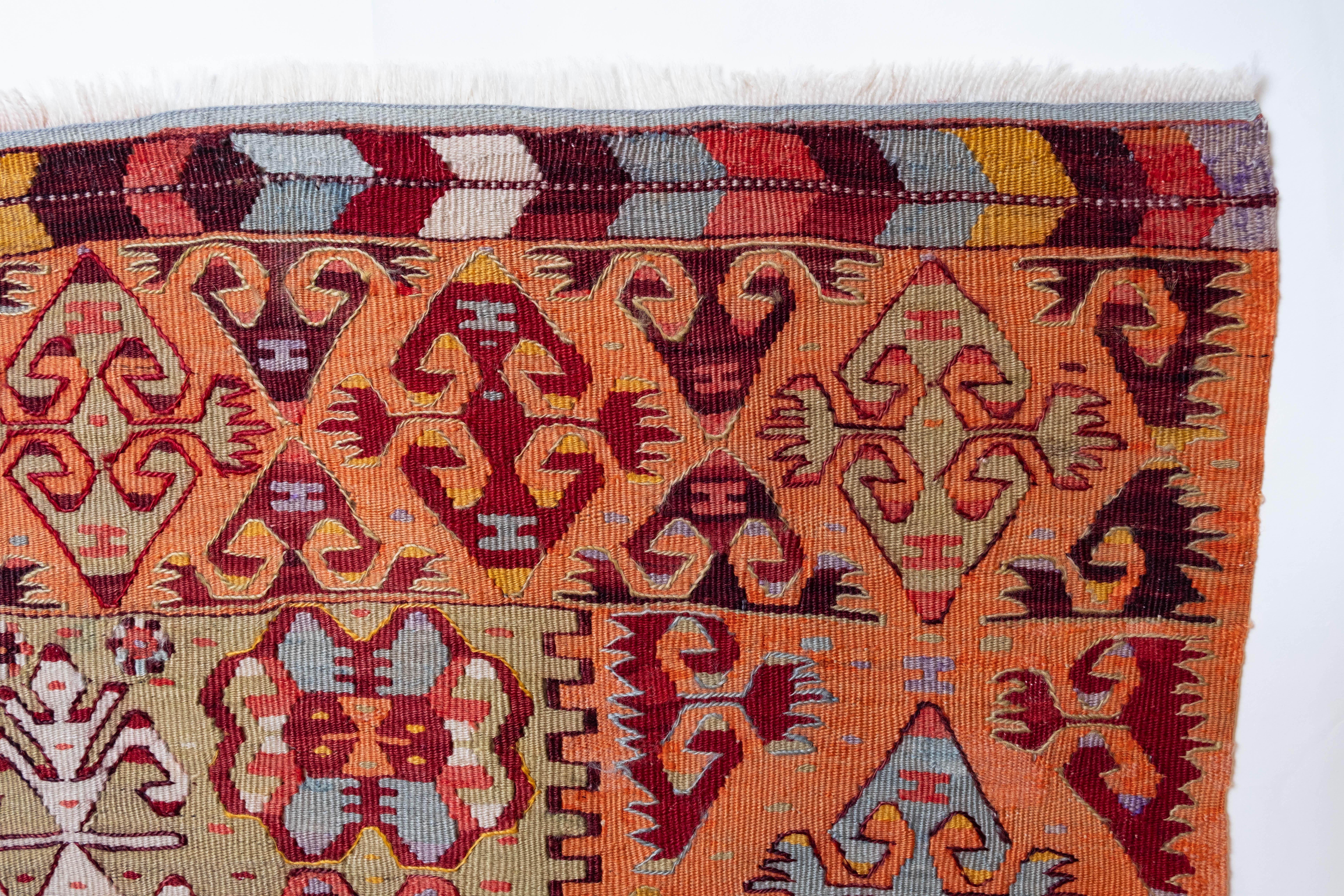 This is Western Anatolian Antique Kilim from the Aydin region with a rare and beautiful color composition.

This highly collectible antique kilim has wonderful special colors and textures that are typical of an old kilim in good condition. It is a