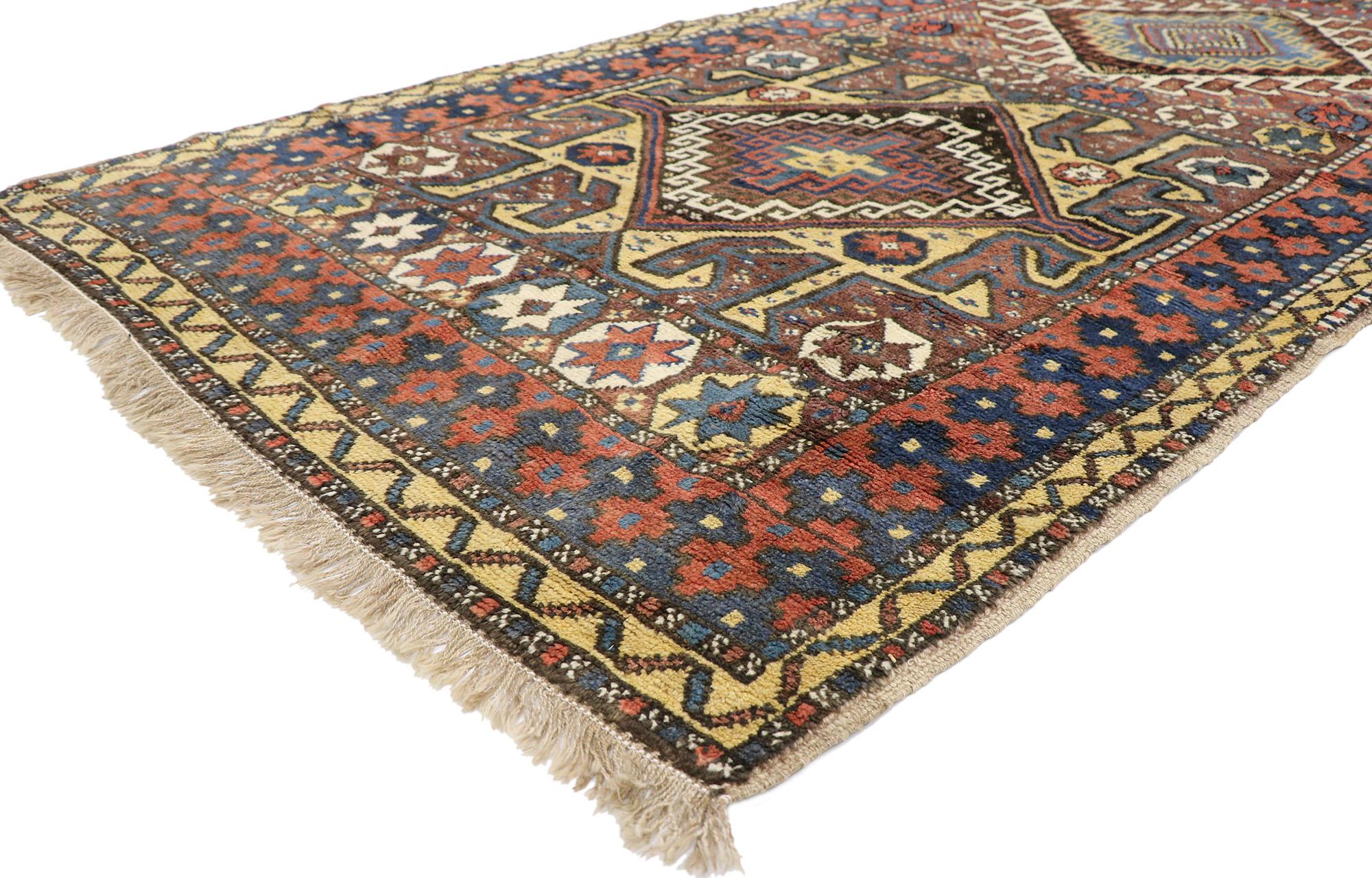 60923 antique Azerbaijan rug with Tribal style 05'00 x 09'03. With its geometric pattern, bold form and earth-tone colors, this hand knotted wool antique Azerbaijan rug possesses rich cultural attributes representing the beauty of tribal weaving.