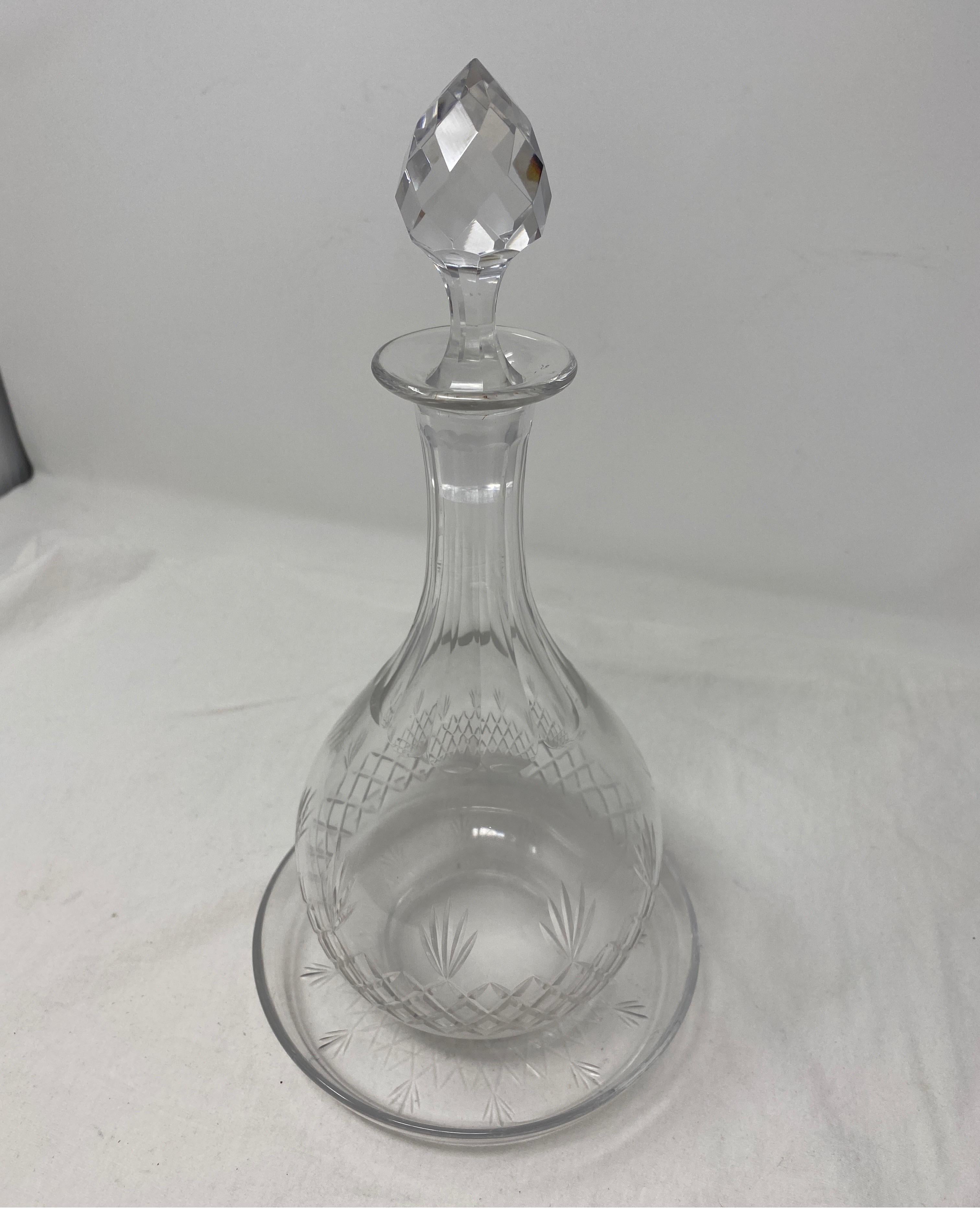 Baccarat carafe with coaster. 19th century. 3 pieces. The width of the carafe is approx. 4 1/2