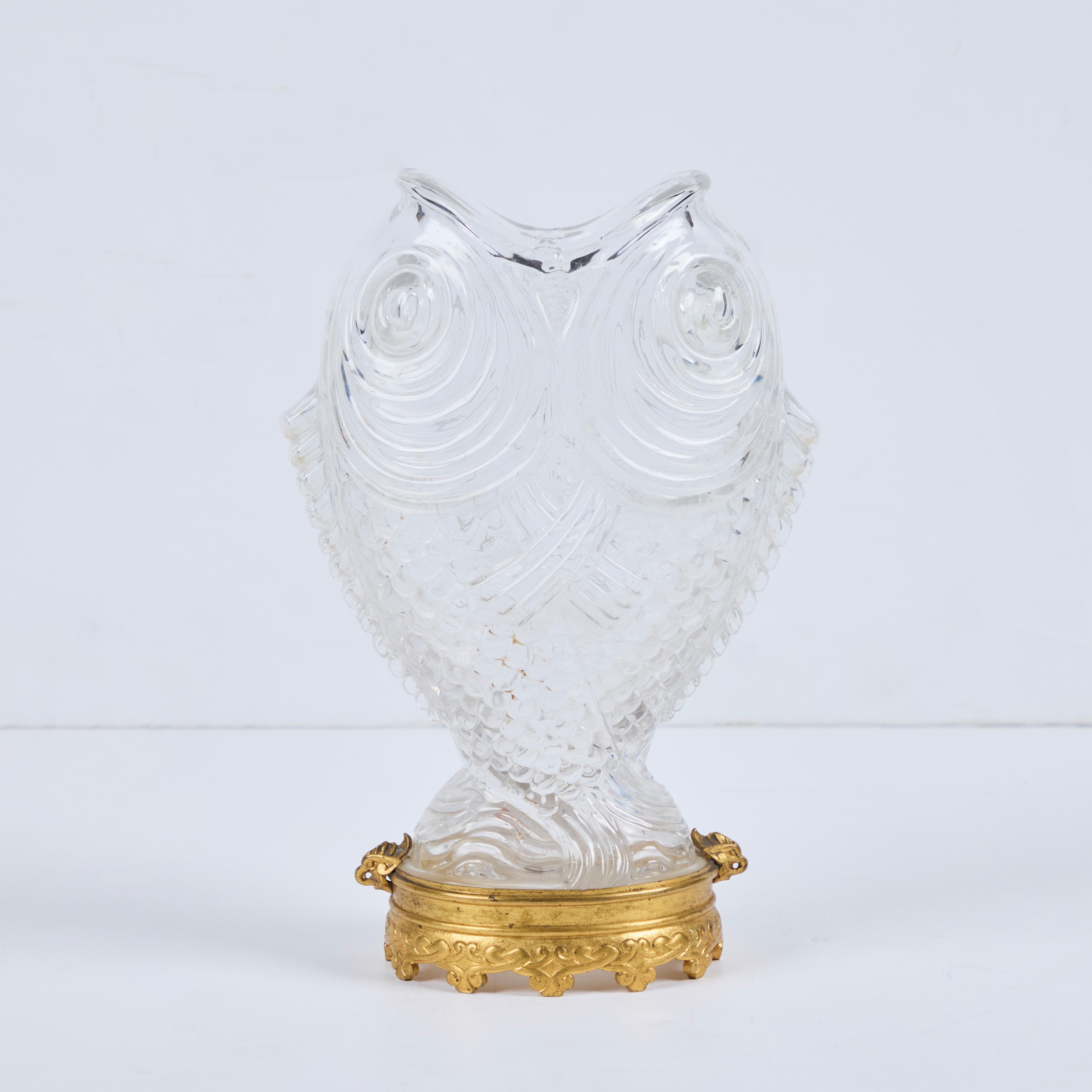 Antique Baccarat “Double Carp” molded crystal vase mounted on a gilded bronze base.