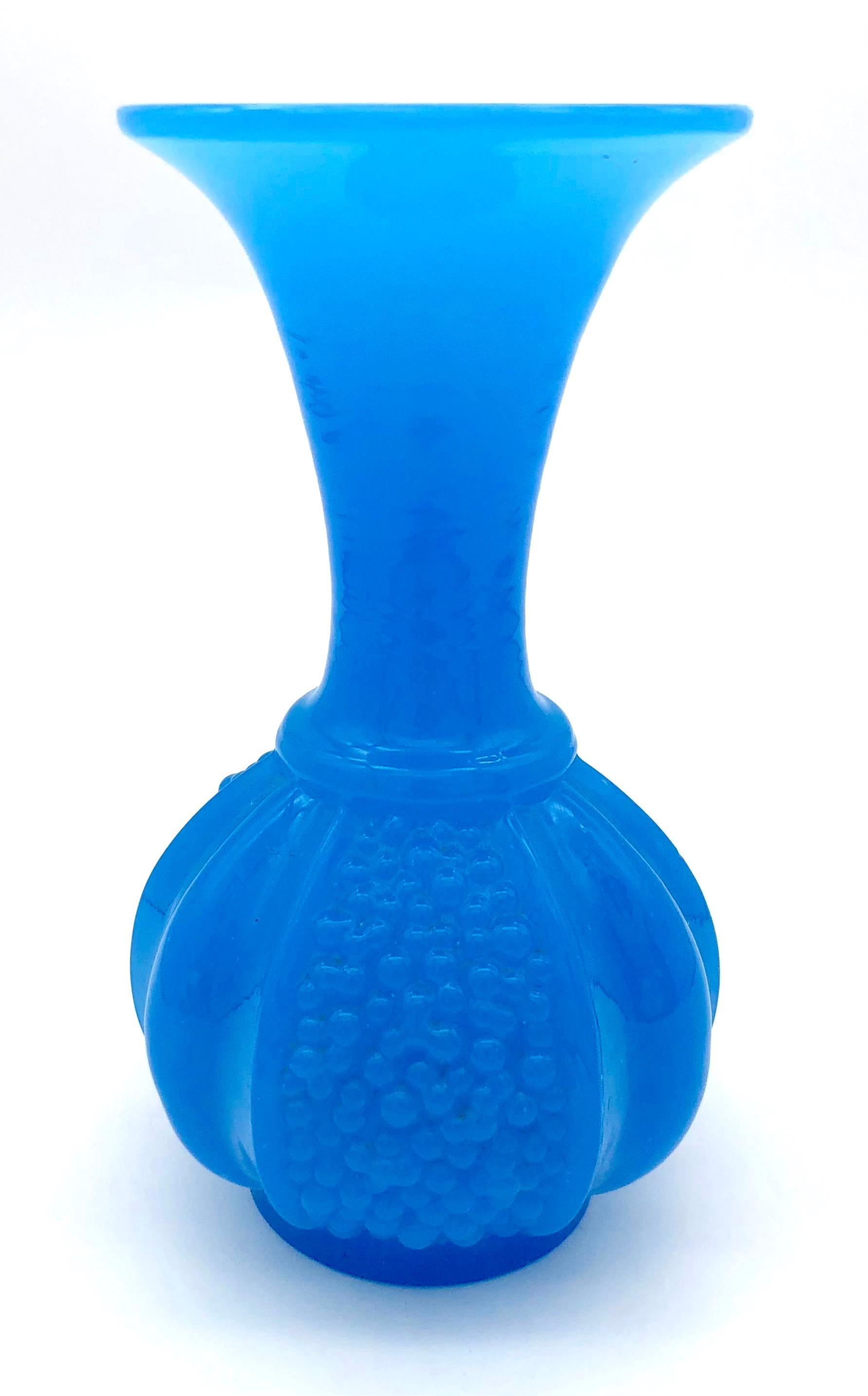 This fine piece of opaque blue molded glass has been made the famous French glass manufacturer Baccarat.