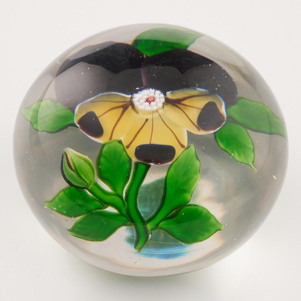 Heading : An Antique Baccarat Pansy Lampwork Paperweight c1880
Date : c1880
Origin : France
Features : Purple and yellow lampwork pansy flower, bud and leaves on a clear ground
Marks : None
Type : Lead
Size : 5.8cm diameter, 4cm height
Condition :