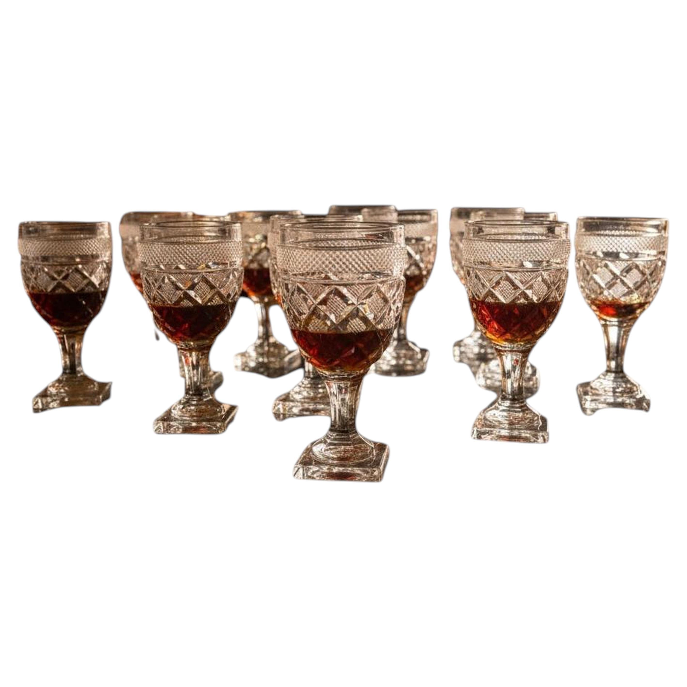 Antique Baccarat Set of 12 Port Wine Glasses by St. Anne Factory, Voneche, 1810.