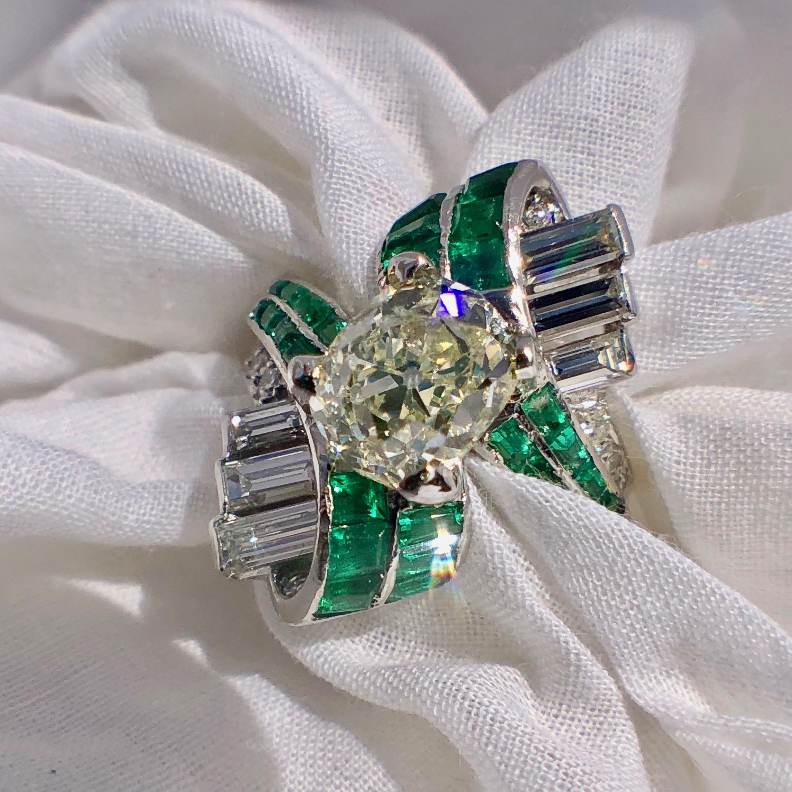 An original and very good condition Art Deco ring 

The central Old Cut Diamond estimated at 1.64ct encapsulated in the calibré Emerald, Baguette and brilliant cut Diamond mount..

Currently a Size K which can be adjusted one or two sizes up or down