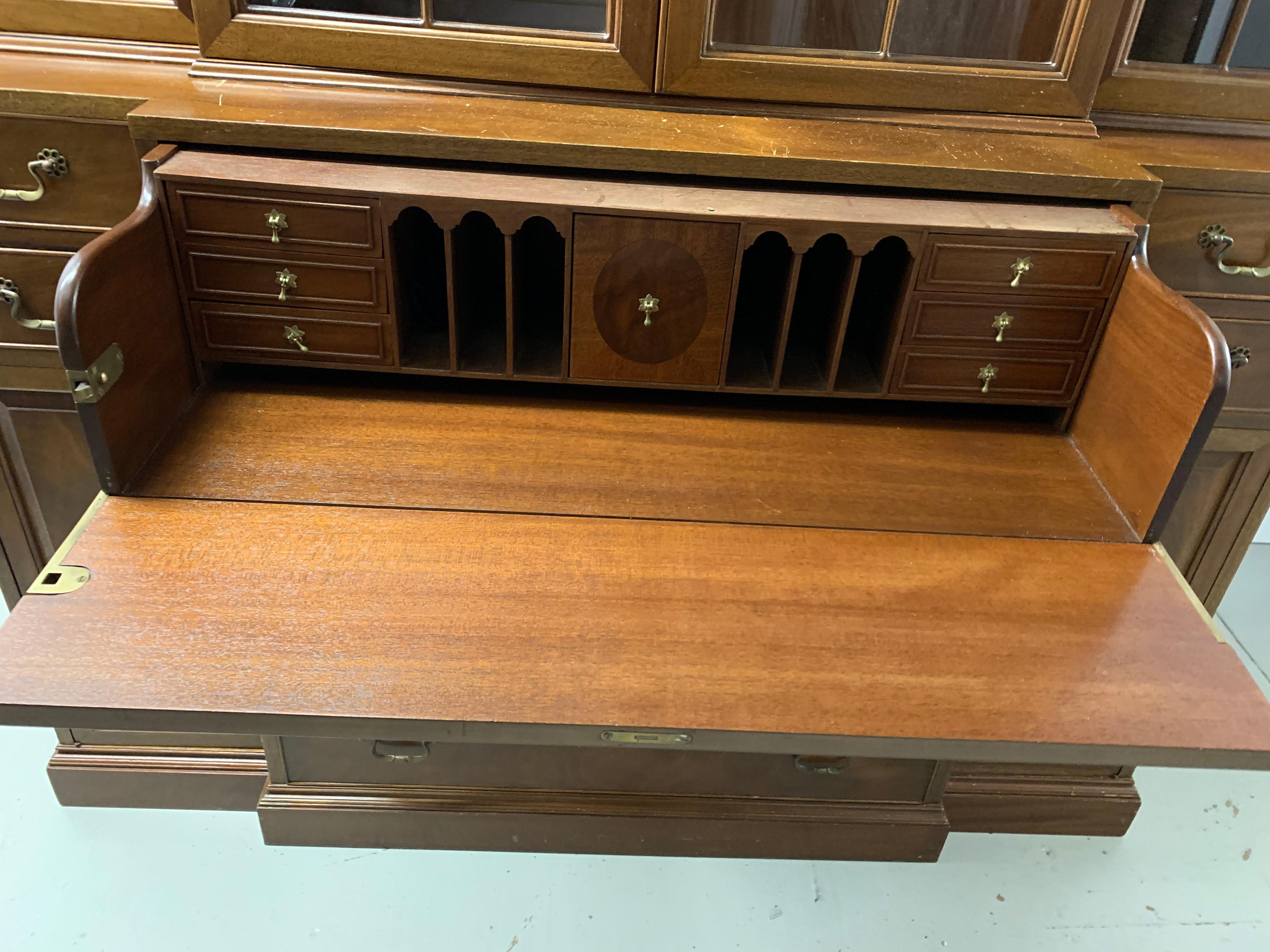 Antique Baker breakfront and secretaire - incredible detail and craftsmanship. Our great grandmother's piece has glass fronts, glass shelves for display, side cabinets with shelving, and the most beautiful pull-out secretaire desk with small drawers