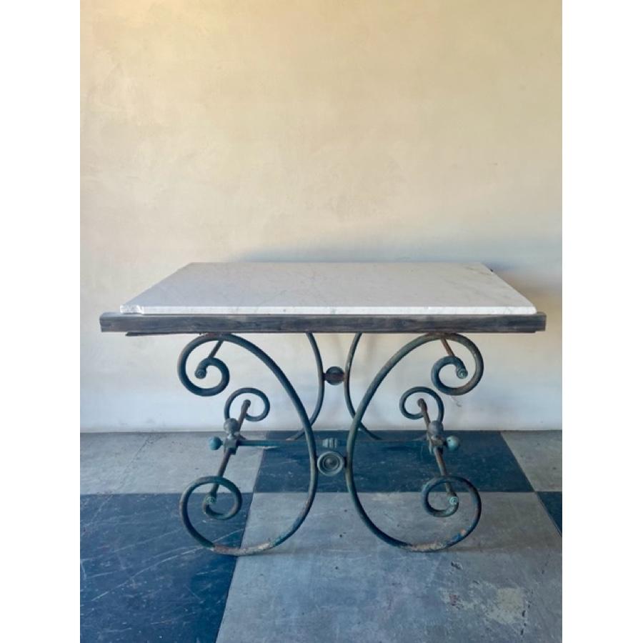 Antique Baker’s table with green metal base. Decorative medallions and finials, scroll legs and marble top. Marble show some cracks and broken edges and staining. 

Item #: FR-0117

Dimensions: 43.5“ W X 27.5“ D X 28” H.
  