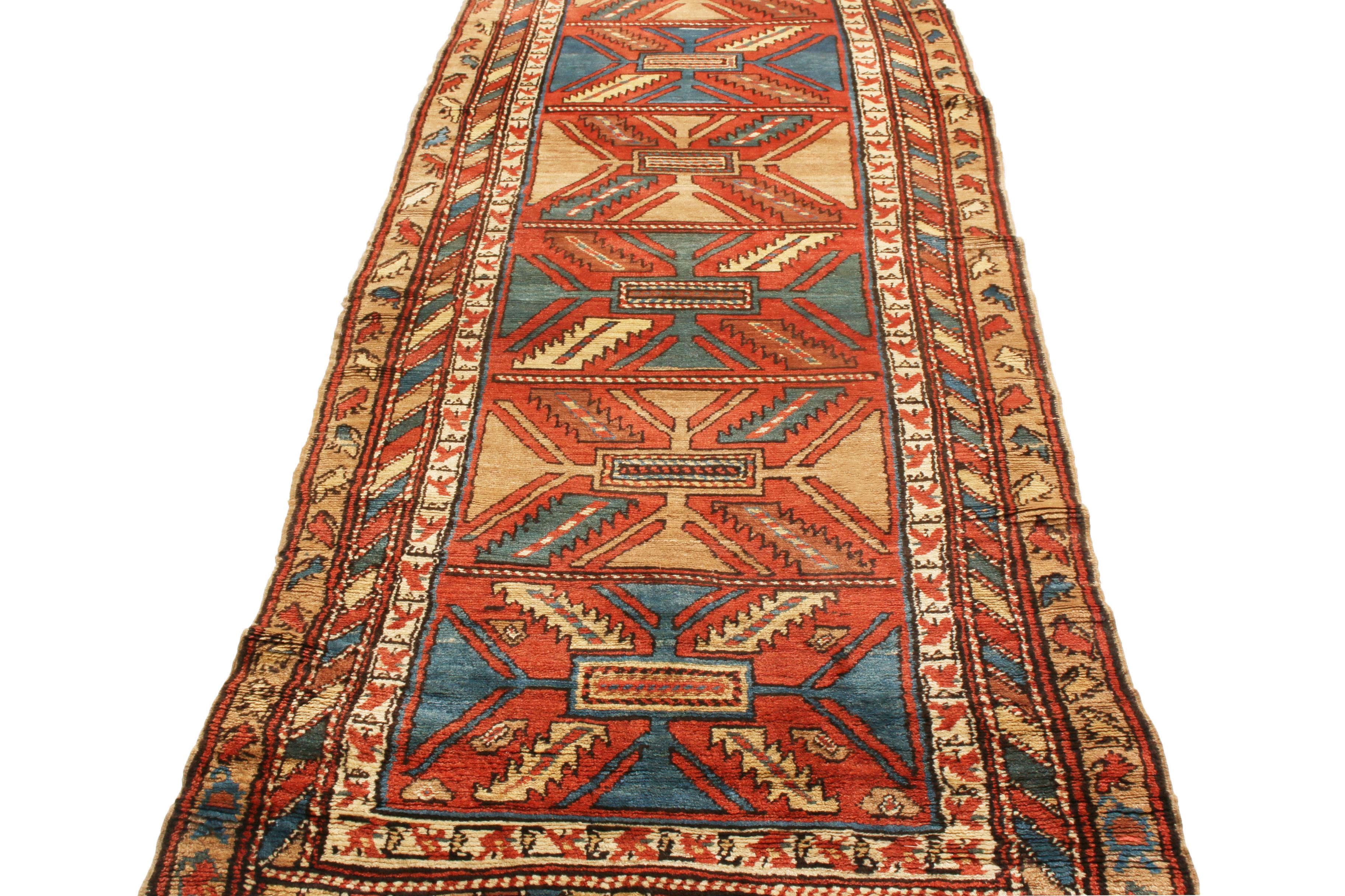 Originating from Persia in 1910, this antique Bakhshaish Persian runner features an uncommon Minimalist approach to vibrant colourways in its geometric field design. Hand knotted in durable, Fine wool, the guard border depicts a repetition of