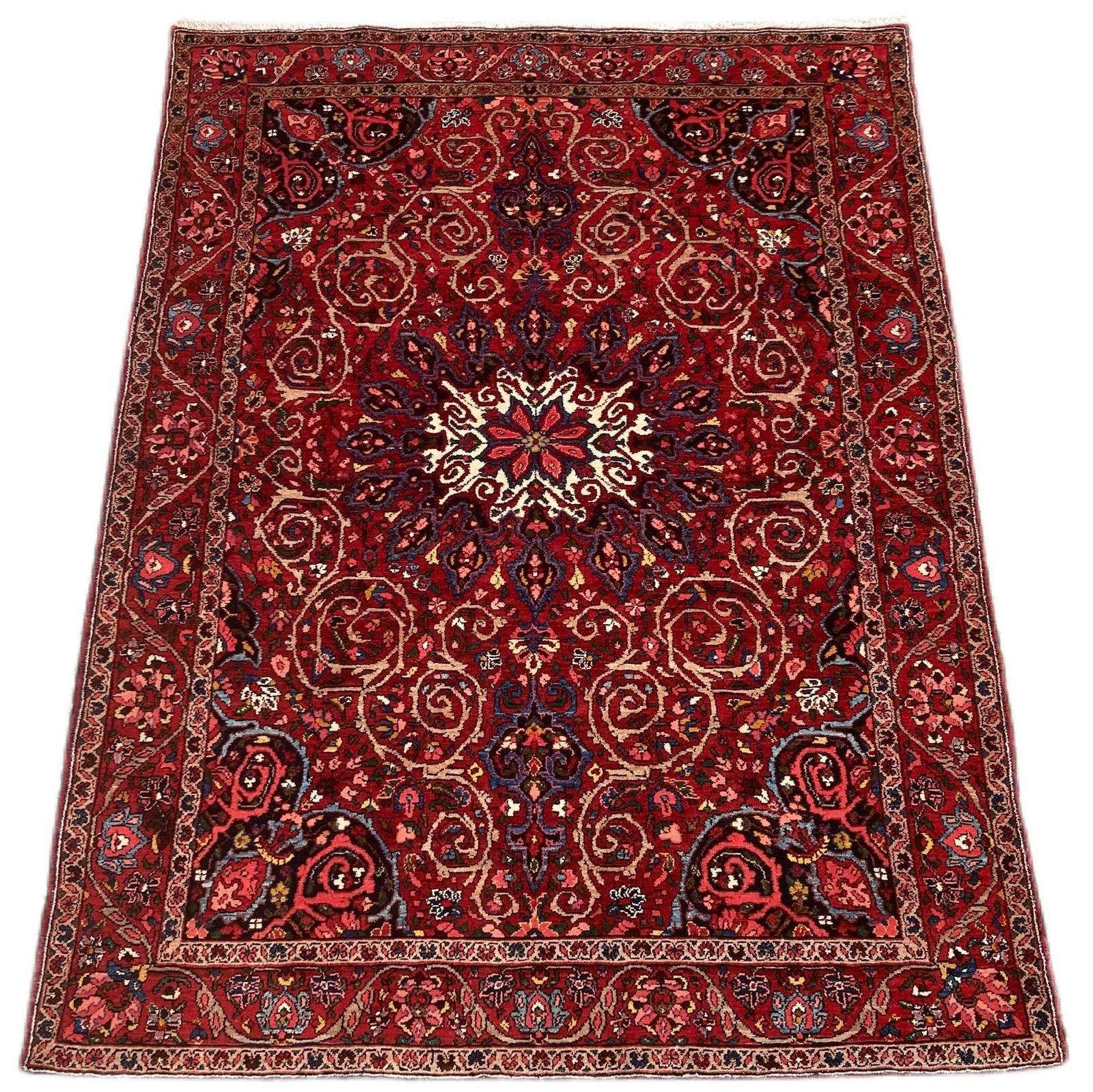 A lovely antique Bakhtiar rug, handwoven circa 1920 with a circular medallion on a terracotta red field and similar border. Lovely wool quality and stunning colours!
Size: 2.12m x 1.59m (7ft x 5ft 3in)
This rug is in good, original condition with