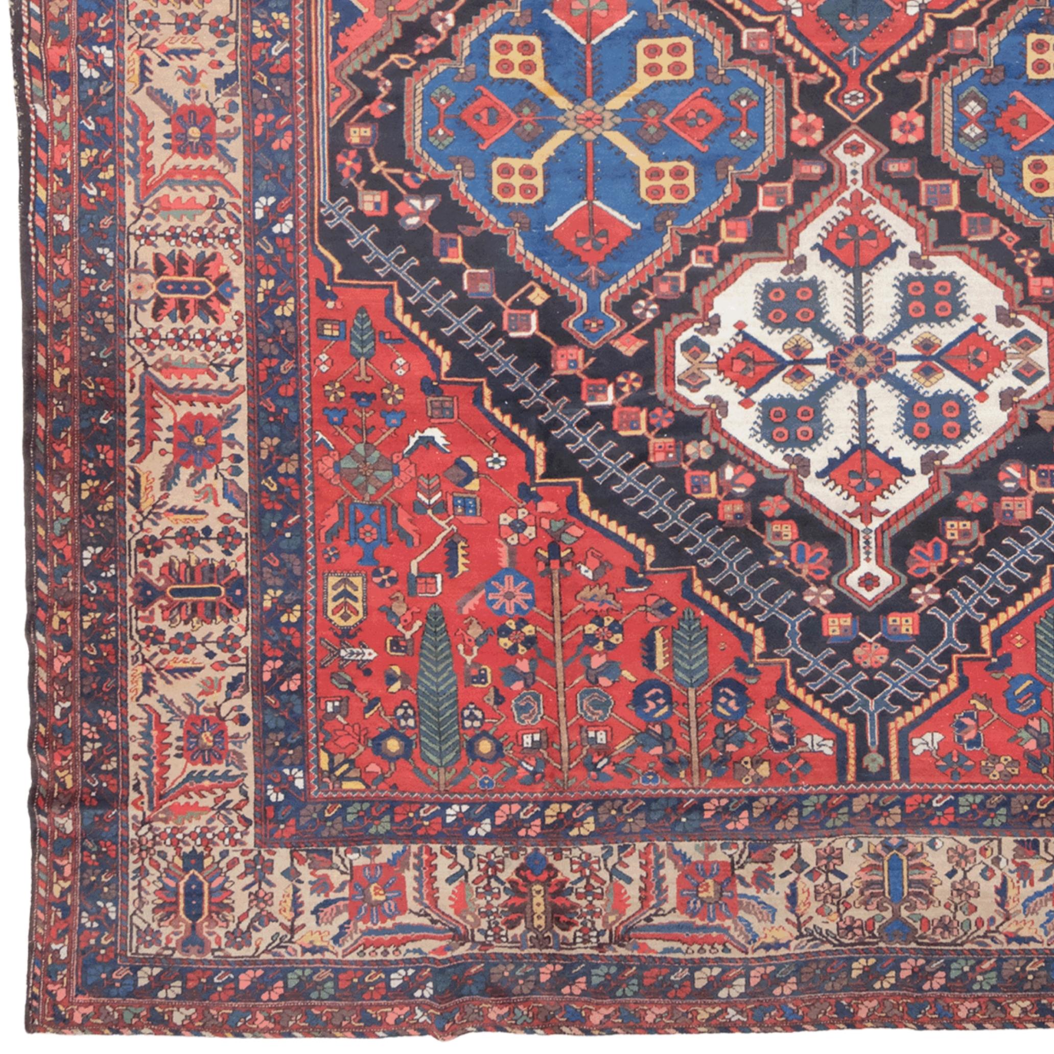 Period: Late 19th century
Dimensions: 440 x 540 cm
Region: Bakhtiari, Iran

This magnificent Bakhtiari rug was woven in the late 19th century in Iran’s Bakhtiari region, using traditional techniques and natural vegetable dyes. Reflecting the rich