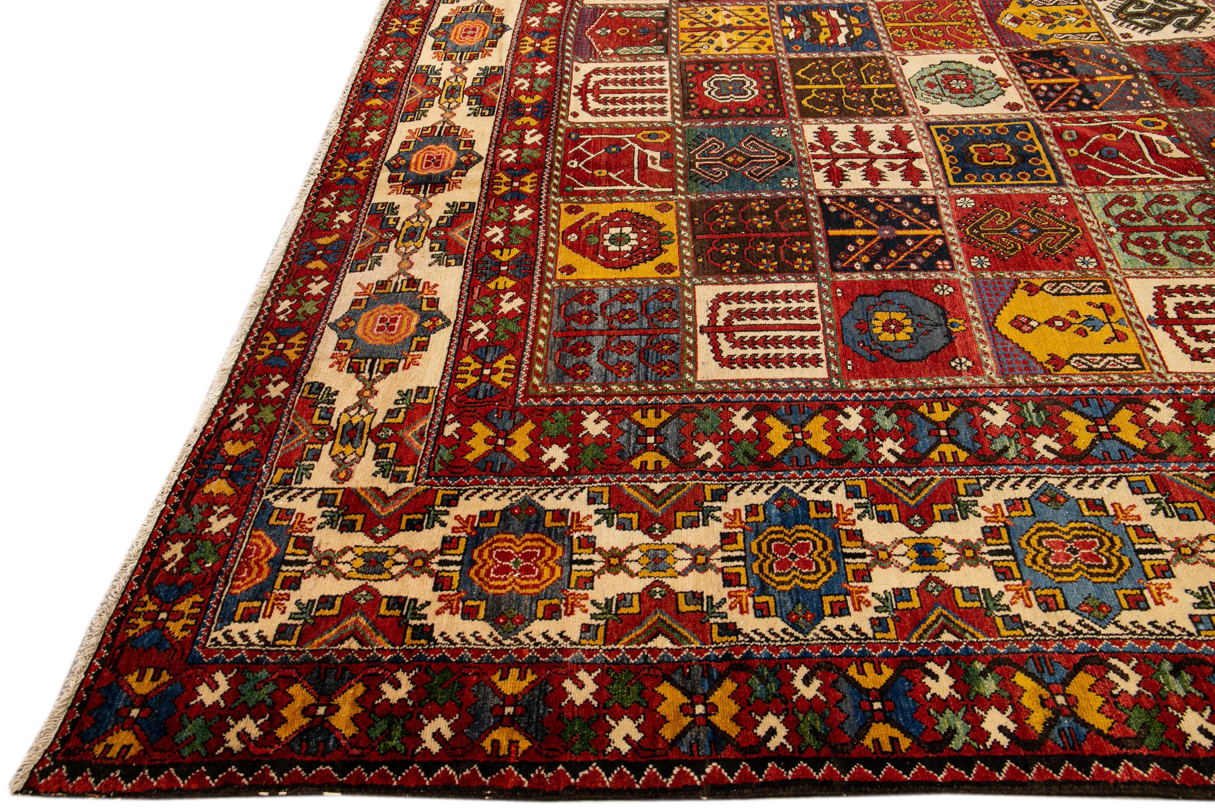 Hand-Knotted Antique Bakhtiari Persian Handmade Multi Designed Red Oversize Wool Rug For Sale