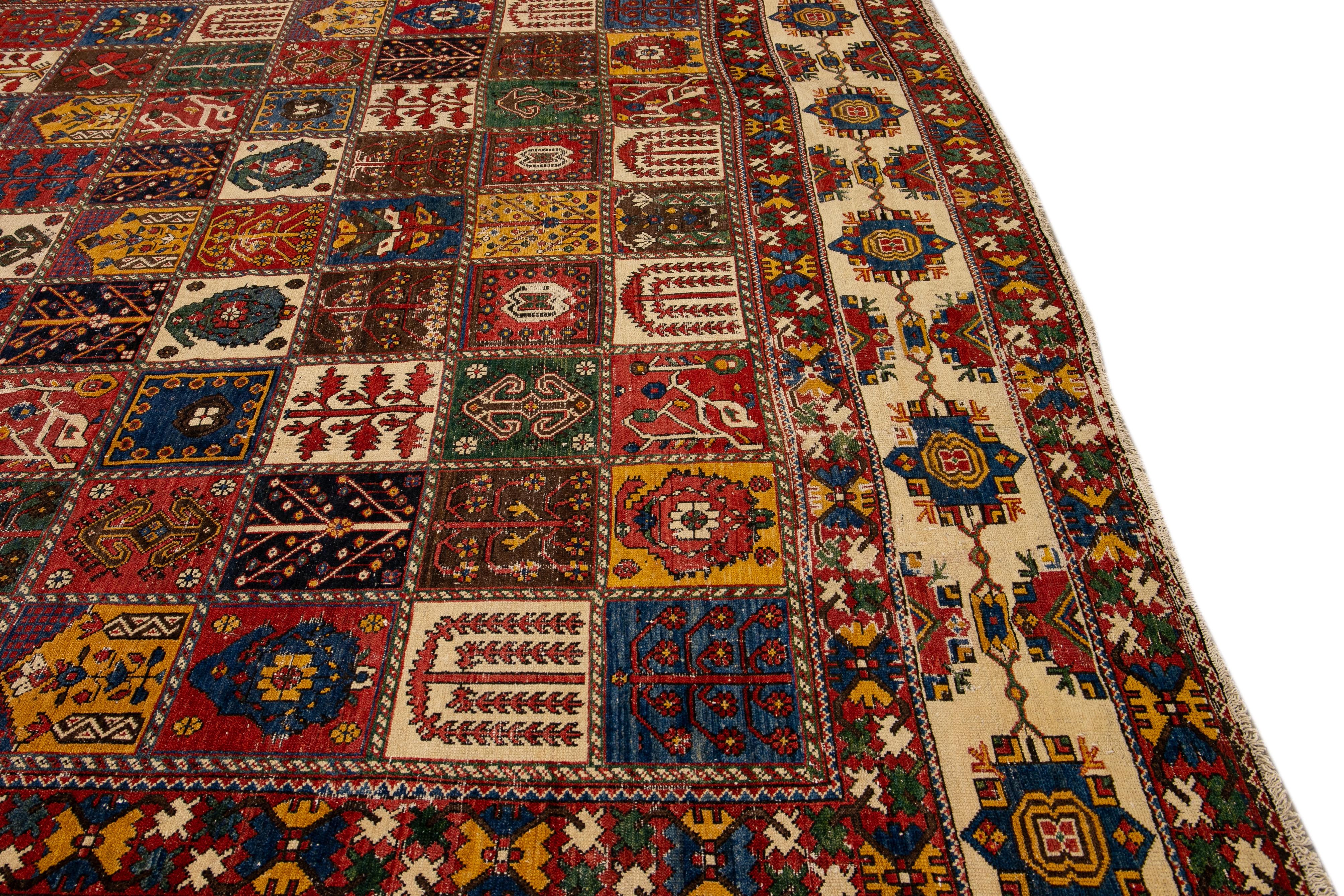 Antique Bakhtiari Persian Handmade Multi Designed Red Oversize Wool Rug For Sale 2