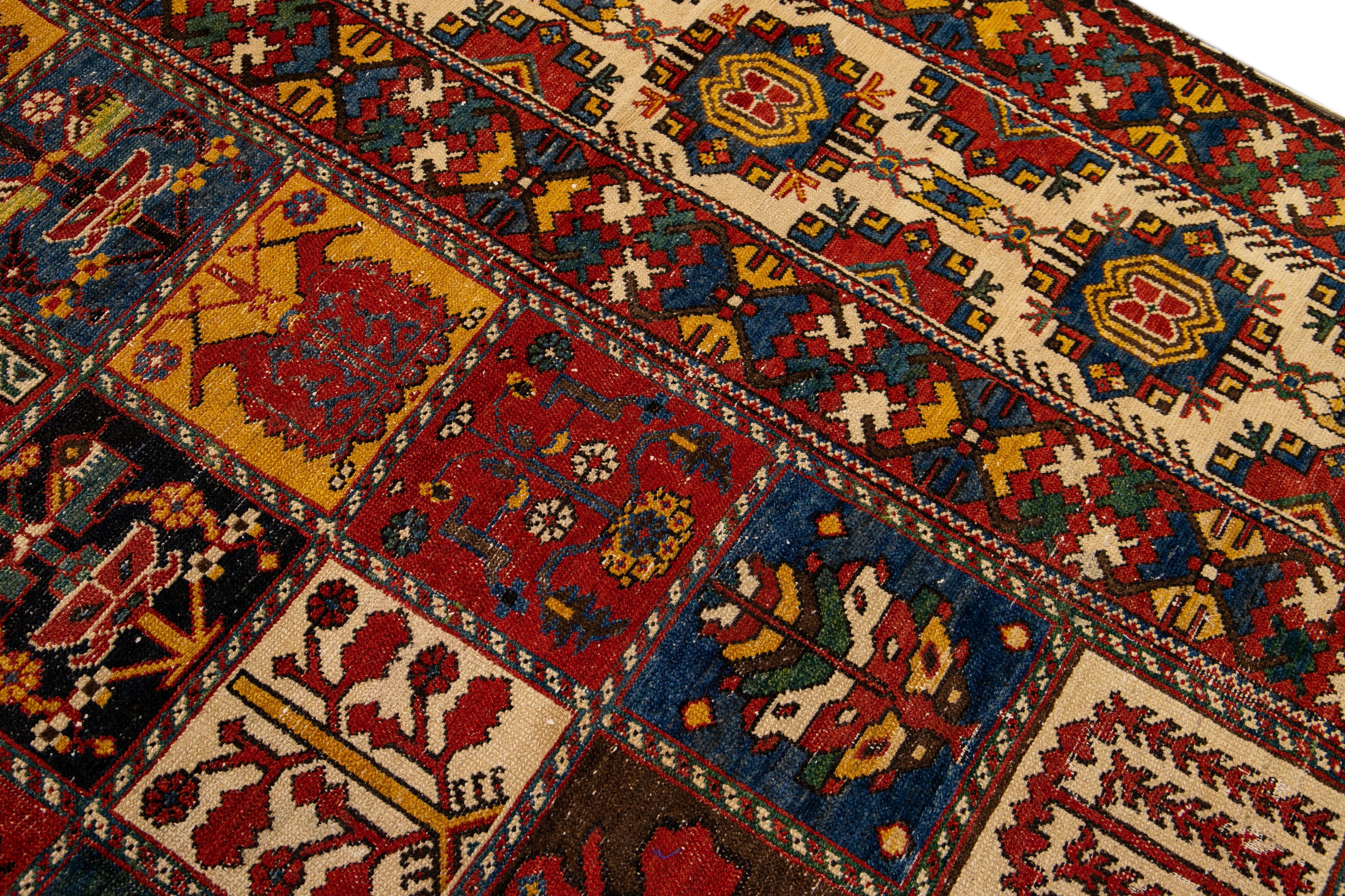 Antique Bakhtiari Persian Handmade Multi Designed Red Oversize Wool Rug For Sale 3