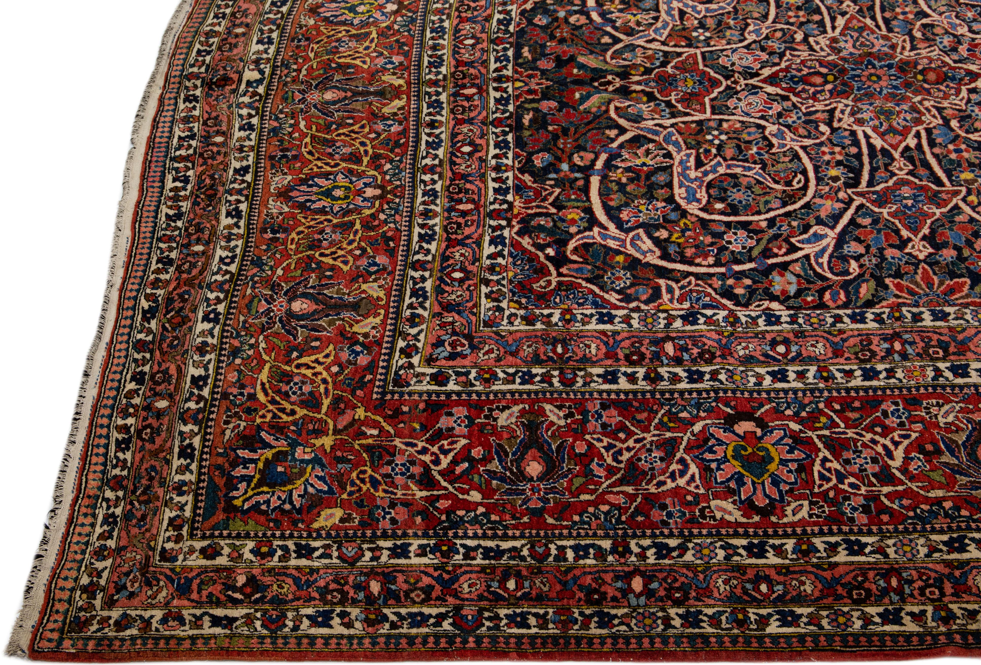 Islamic Antique Bakhtiari Persian Handmade Red & Blue Wool Rug With Floral Pattern For Sale