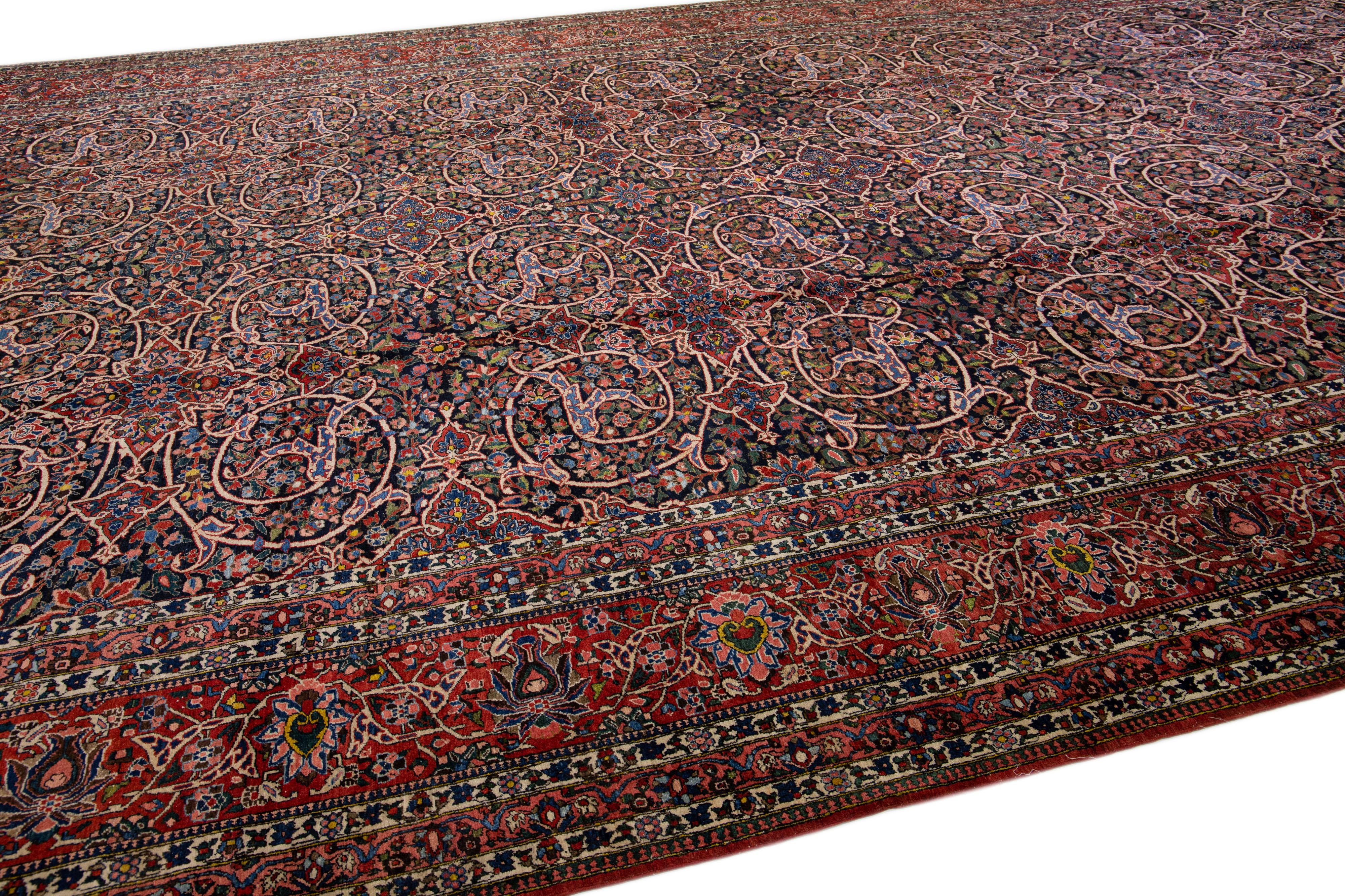 Antique Bakhtiari Persian Handmade Red & Blue Wool Rug With Floral Pattern In Good Condition For Sale In Norwalk, CT